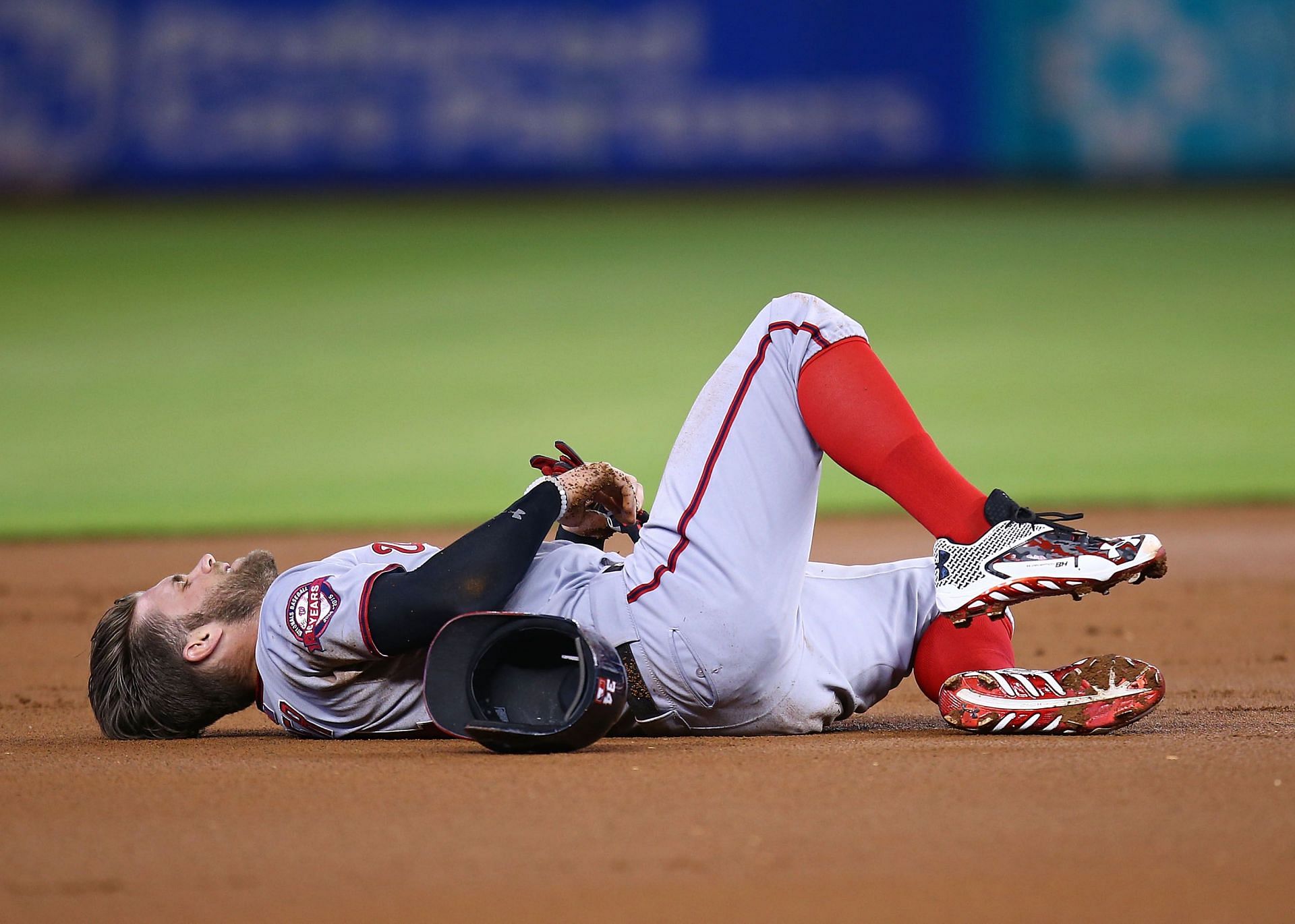 Bryce Harper of the Philadelphia Phillies after colliding with Miguel Rojas of the Miami Marlins