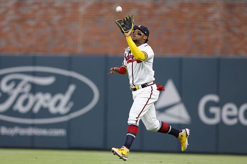 Ronald Acuna Jr. of the Atlanta Braves catches a fly ball against the San Francisco Giants.