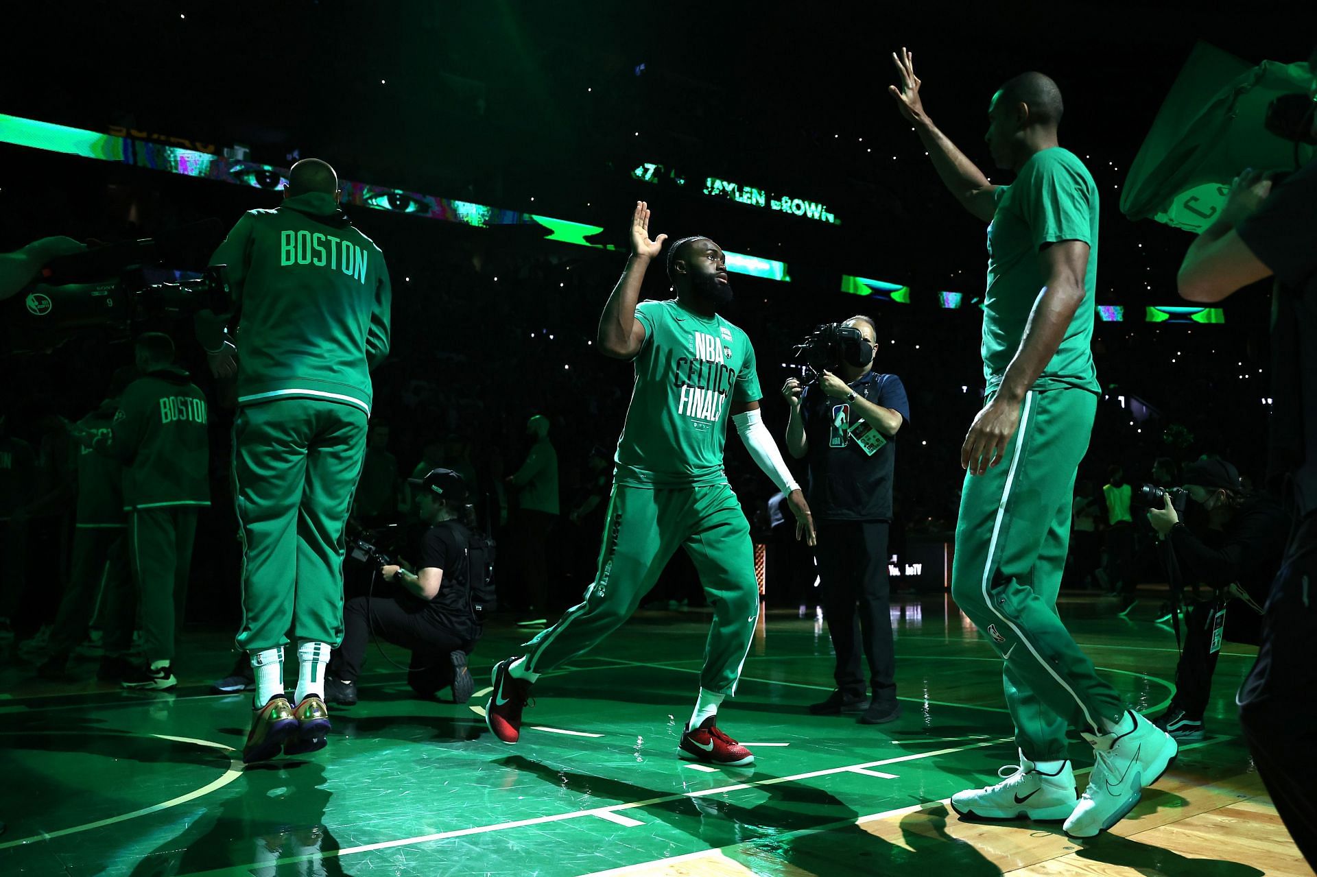 Jaylen Brown walks out during the player introductions.