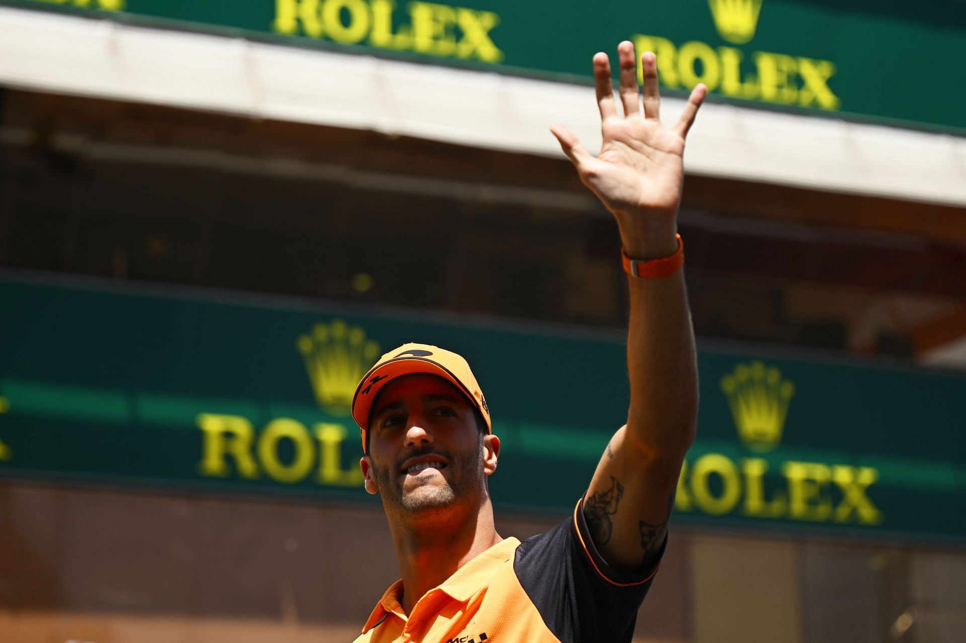 Daniel Ricciardo waves to fans ahead of the 2022 F1 Spanish GP in Barcelona (Photo by Clive Mason/Getty Images)