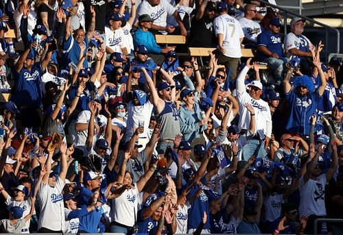 The crowd cheers for the Los Angeles Dodgers during a game against the Atlanta Braves.