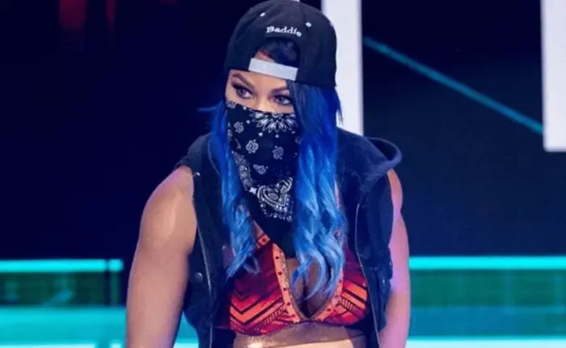 Mia Yim wearing a bandana mask during one of her entrances