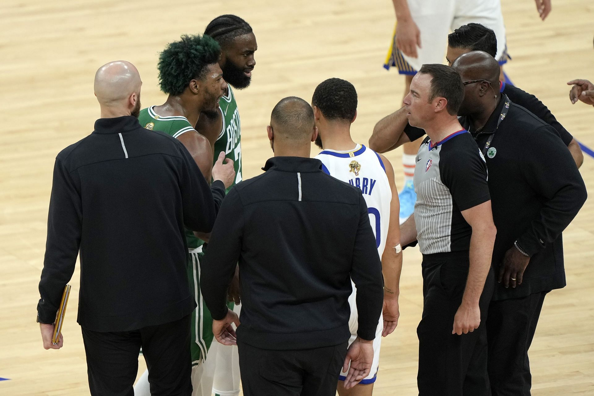 Jaylen Brown and Marcus Smart argue a call