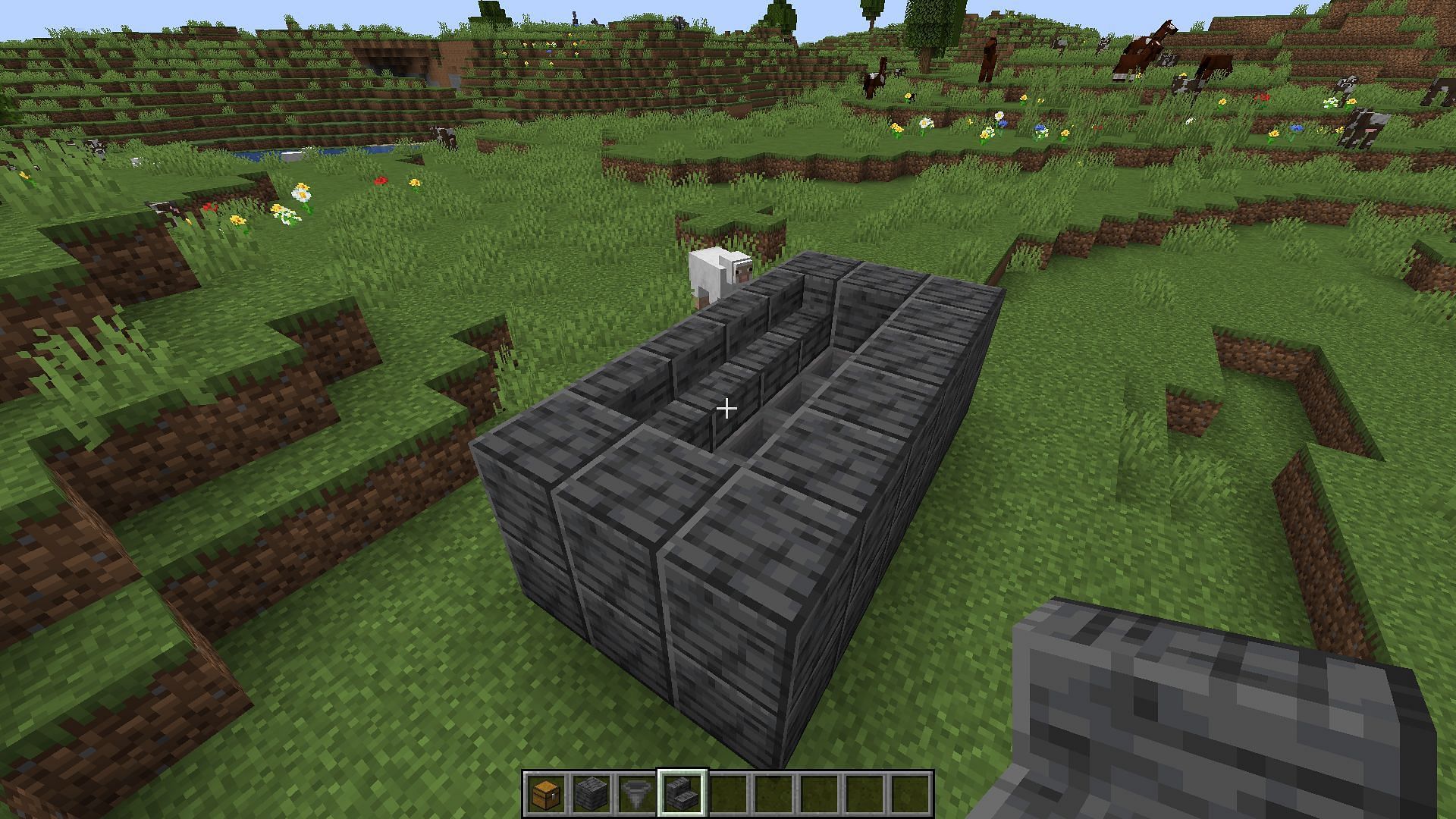 The basic foundation wall around where the stone will form (Image via Minecraft)