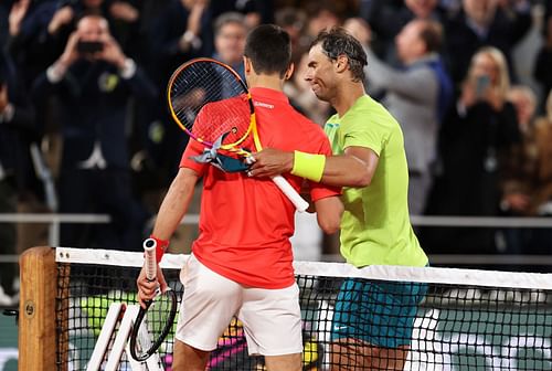 Novak Djokovic and Rafael Nadal shake hands after their French Open quarter-final match