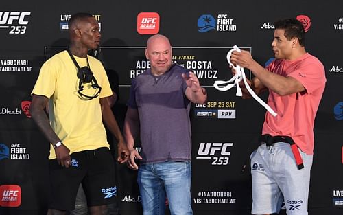 Israel Adesanya (left), Dana White (center), Paulo Costa (right)