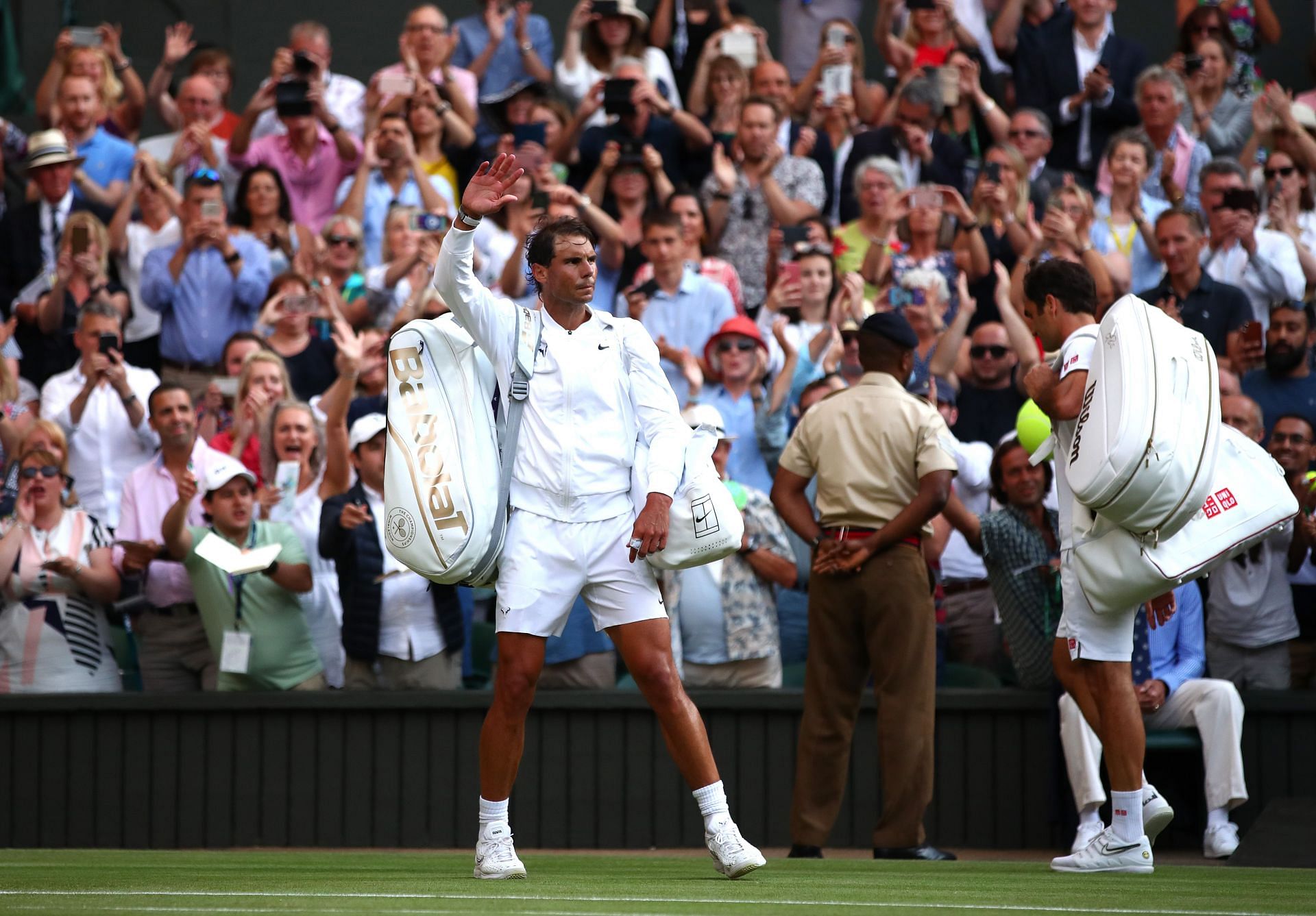 Rafael Nadal acknowledges Wimbledon crowd. Photo by Clive Brunskill/Getty Images
