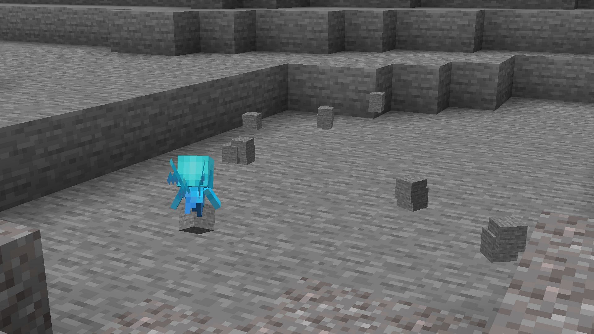 Allay clearing out an area filled with stone blocks (Image via Minecraft 1.19)