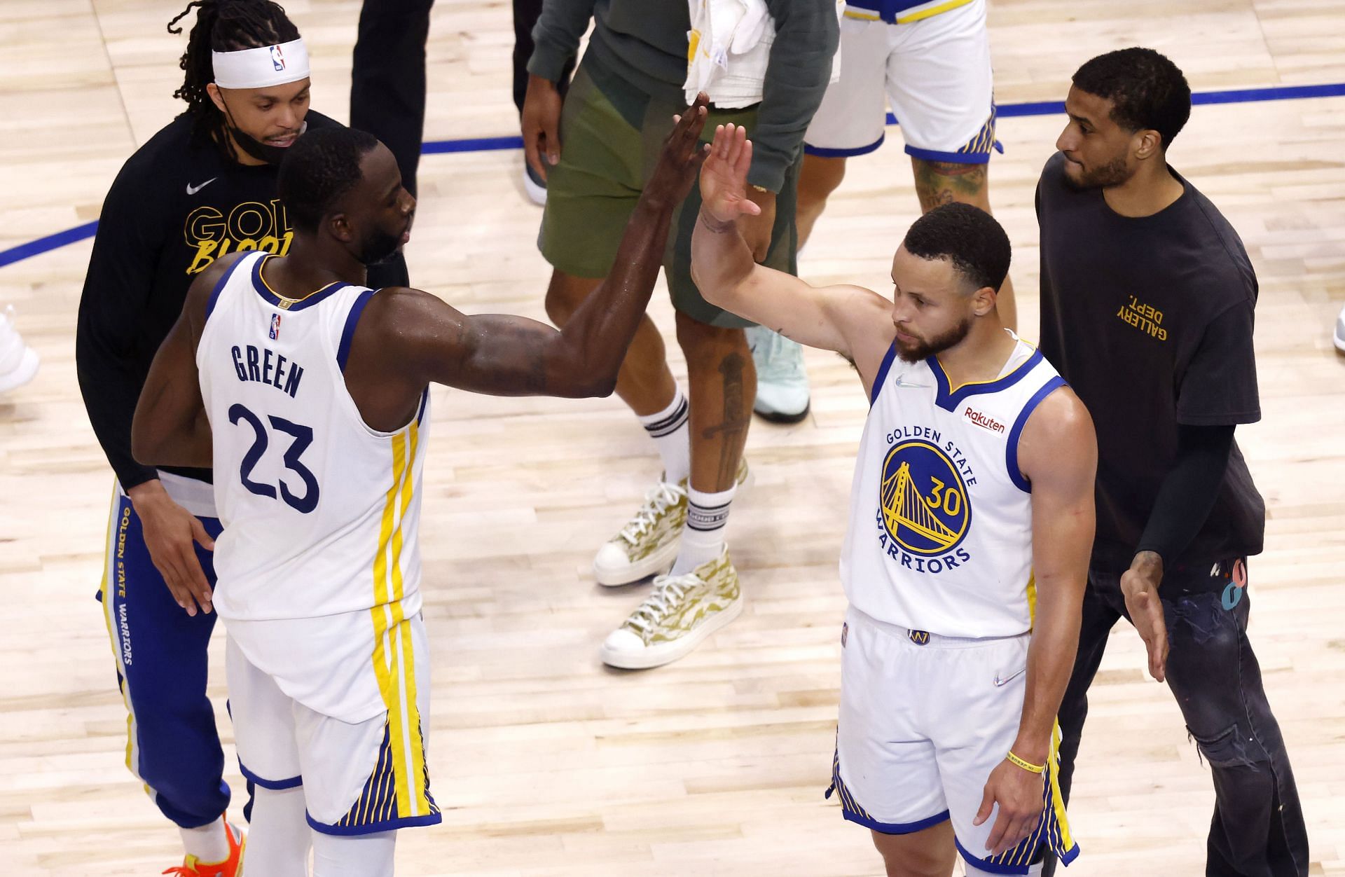Steph Curry and Draymond Green celebrate during Golden State Warriors v Dallas Mavericks - Game Three