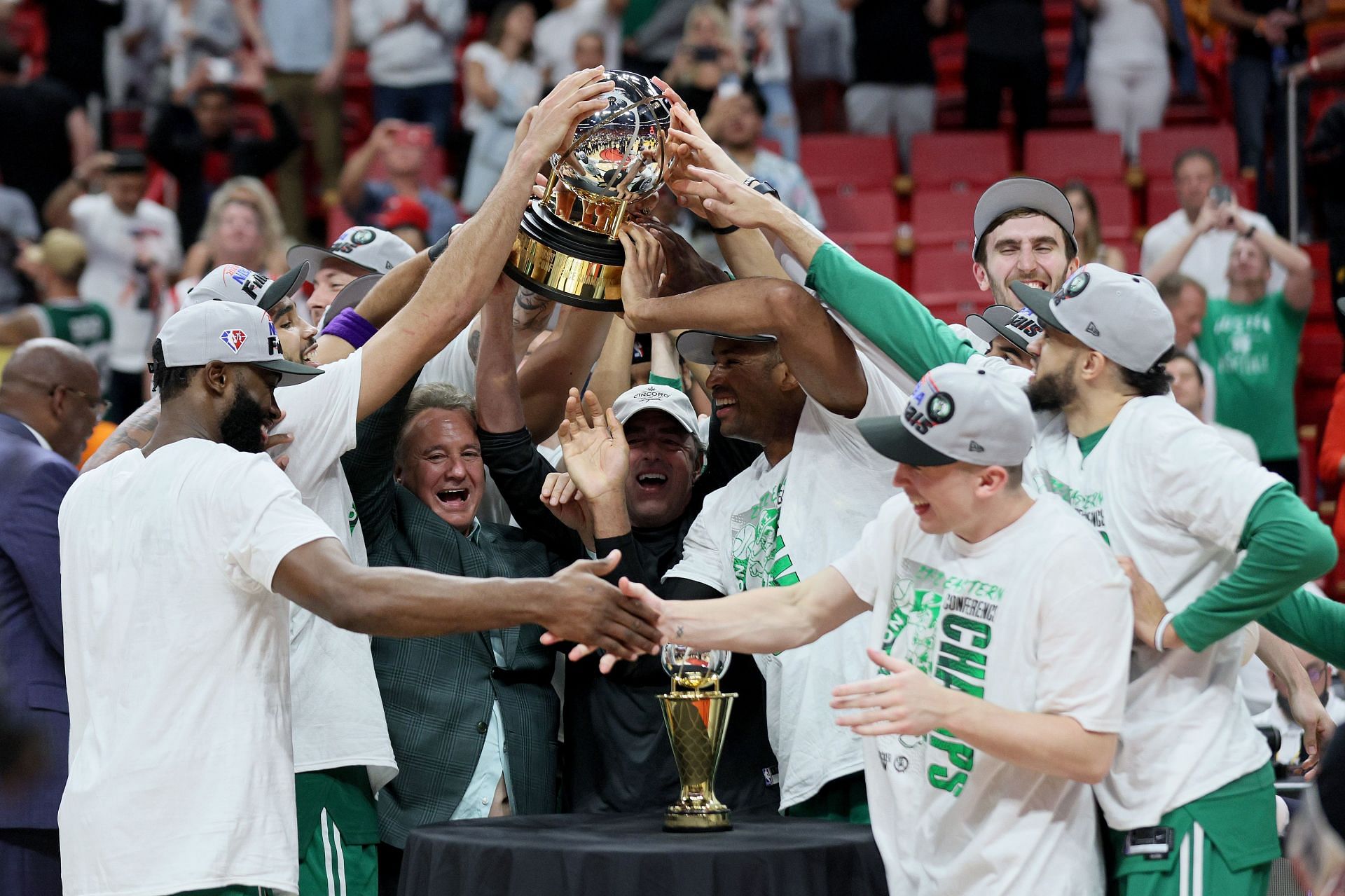 The Boston Celtics celebrates with the Eastern Conference Bob Cousy champions trophy
