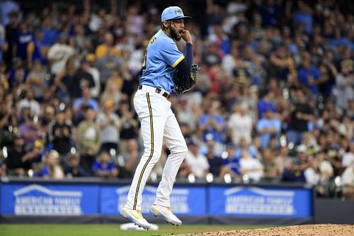 Devin Williams of the Milwaukee Brewers reacts after a strikeout against the Toronto Blue Jays.