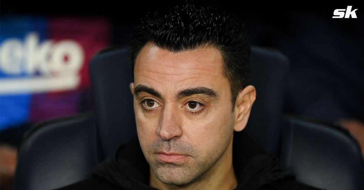 Barcelona manager Xavi Hernandez looks on.