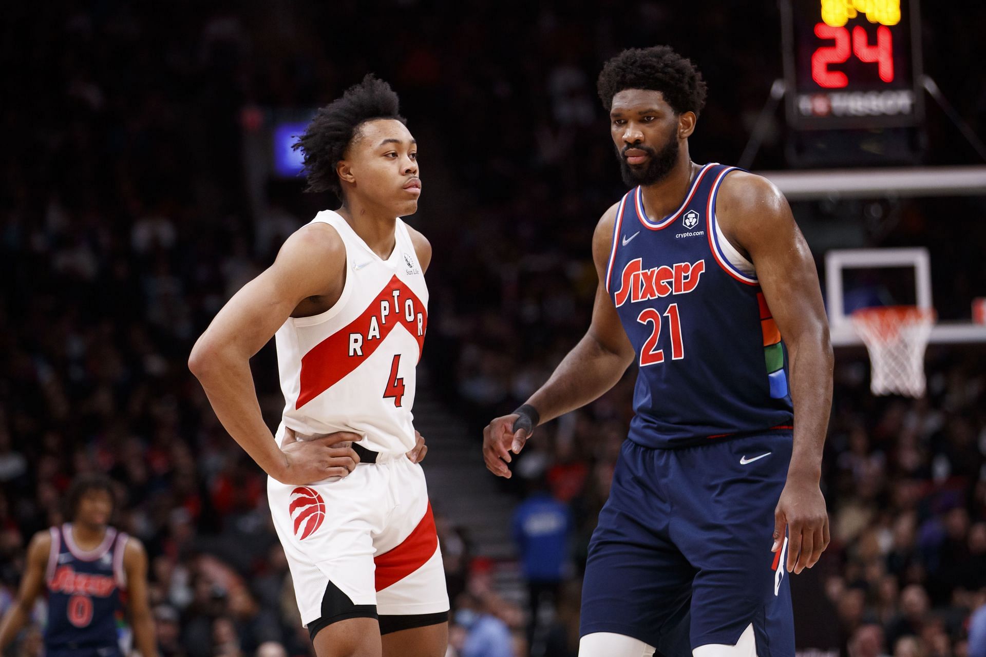 Scottie Barnes and Joel Embiid in action during Philadelphia 76ers v Toronto Raptors - Game Six