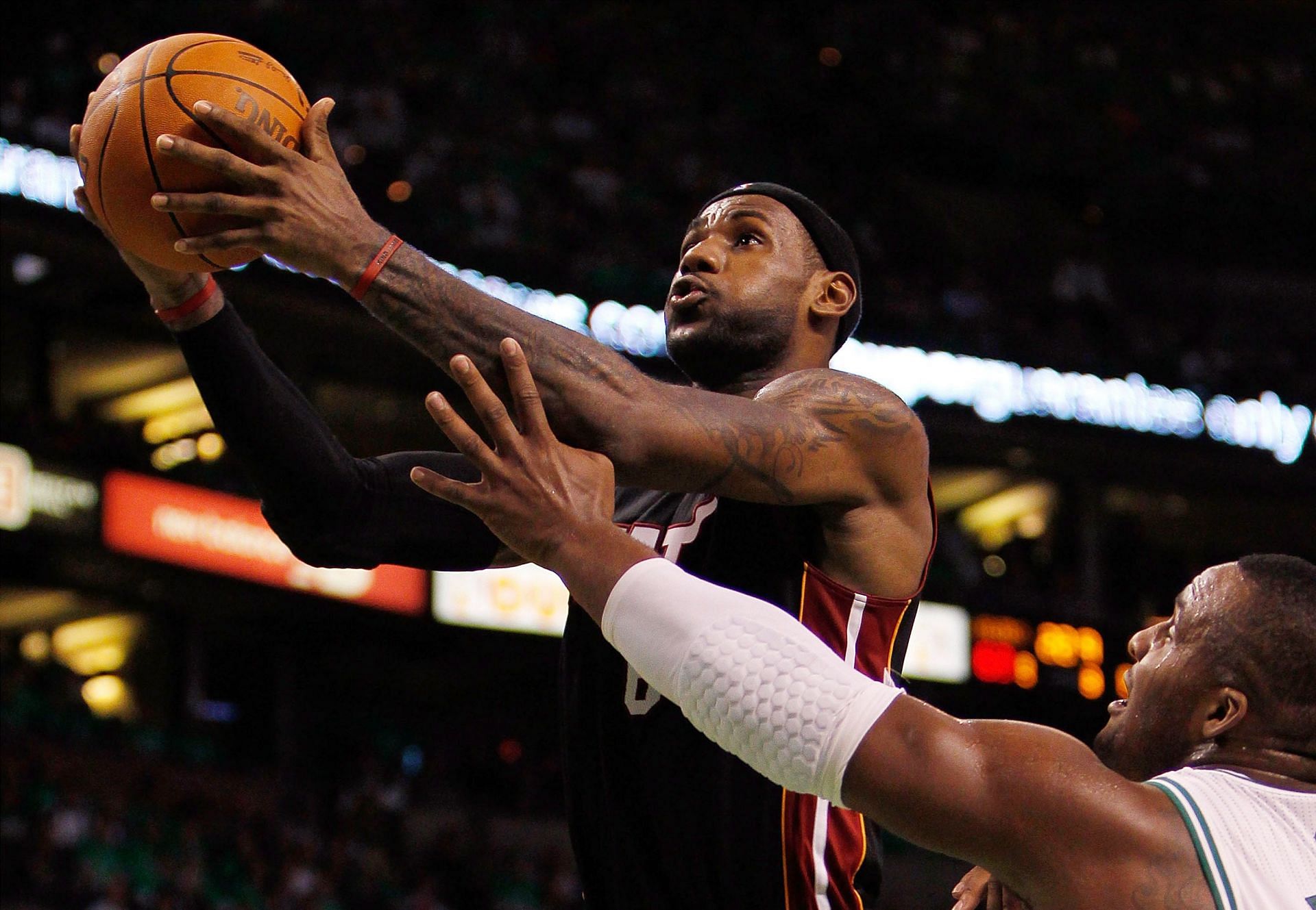 LeBron James of the Miami Heat against Glen Davis of the Boston Celtics