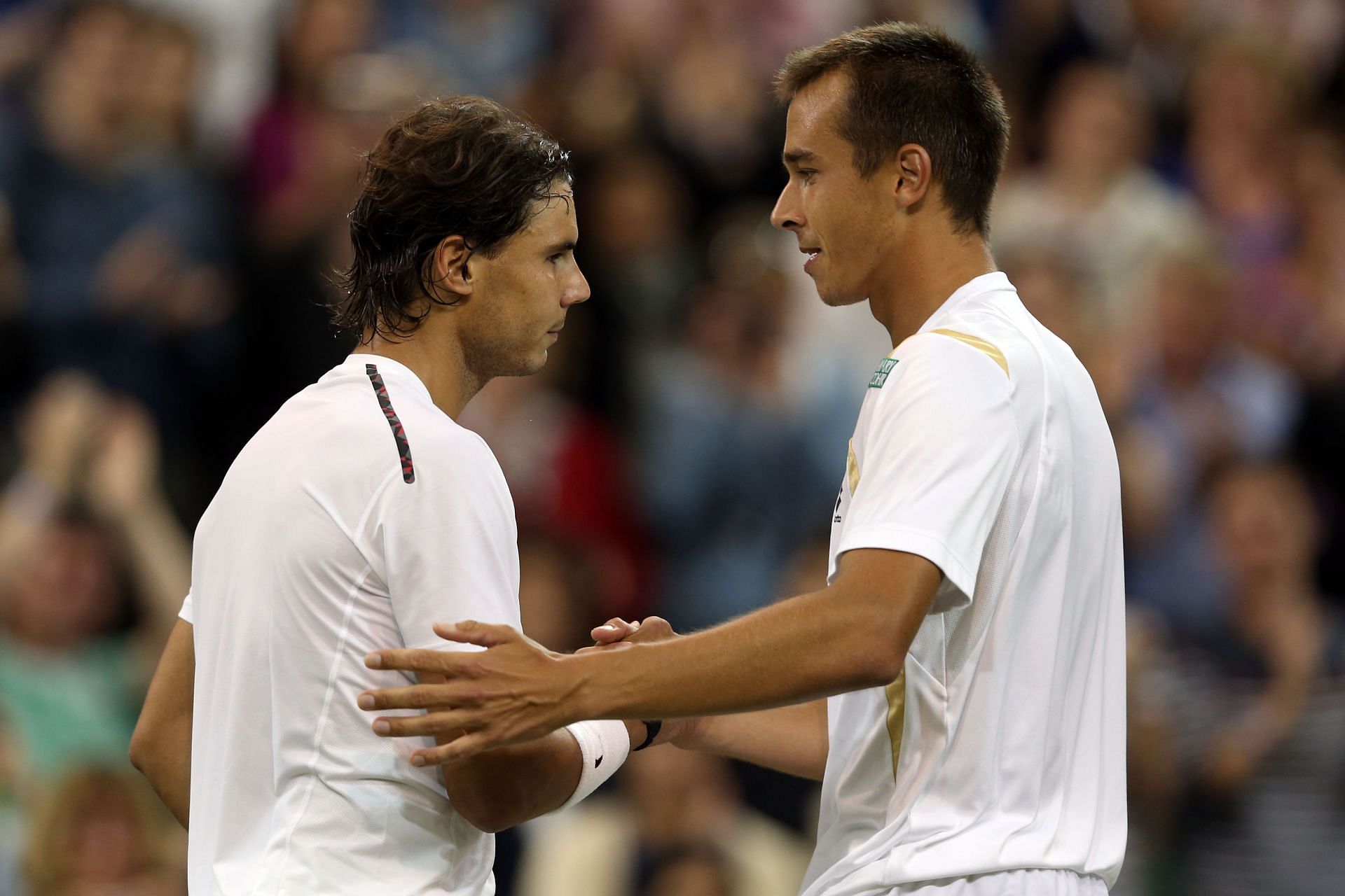 Rafael Nadal and Lukas Rosol after their Wimbledon 2012 clash