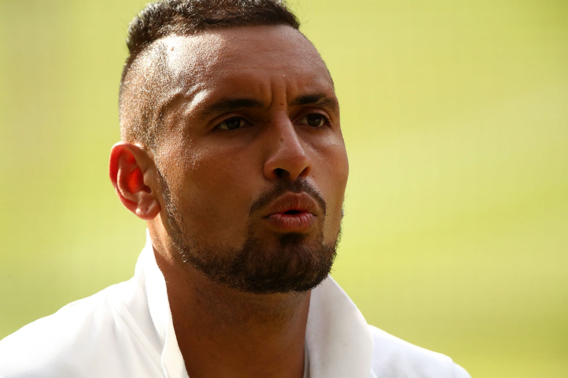 Nick Kyrgios reacts during his second-round loss to Nadal at Wimbledon 2019