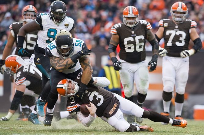 WATCH: Hilarious video of Browns QB getting engulfed by American flag leaves fans in splits