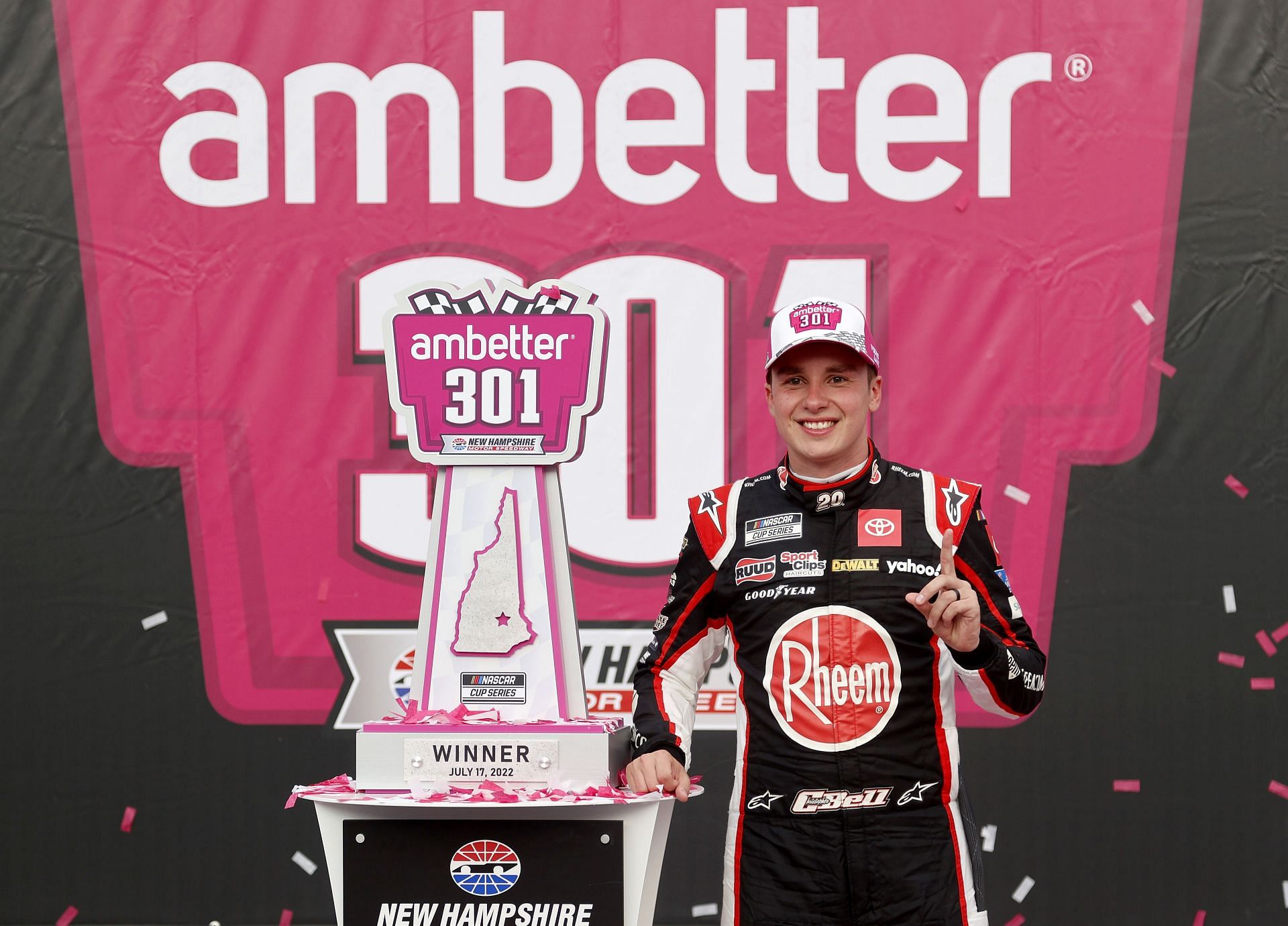 Christopher Bell celebrates in victory lane after winning the NASCAR Cup Series Ambetter 301 at New Hampshire Motor Speedway (Photo by Tim Nwachukwu/Getty Images)