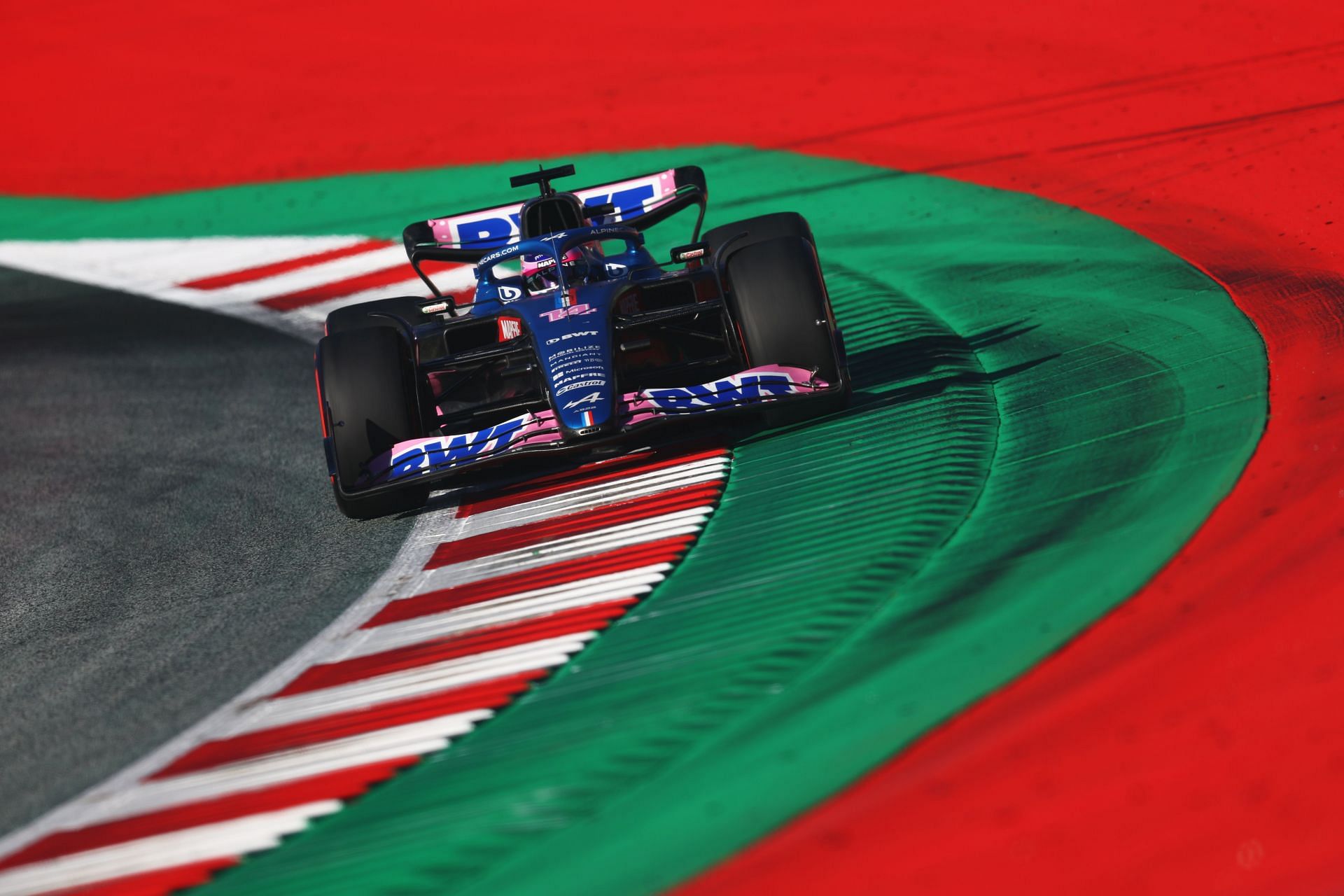 Fernando Alonso in action during the 2022 F1 Austrian GP weekend (Photo by Clive Rose/Getty Images)