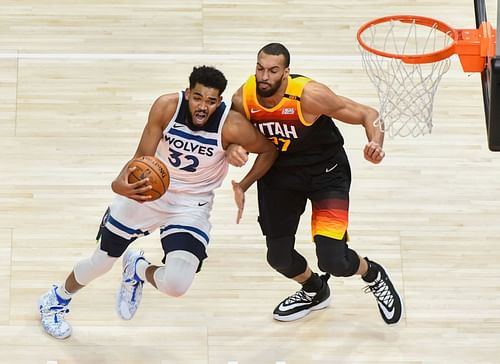 Minnesota Timberwolves v Utah Jazz; Karl-Anthony Towns drives on Rudy Gobert