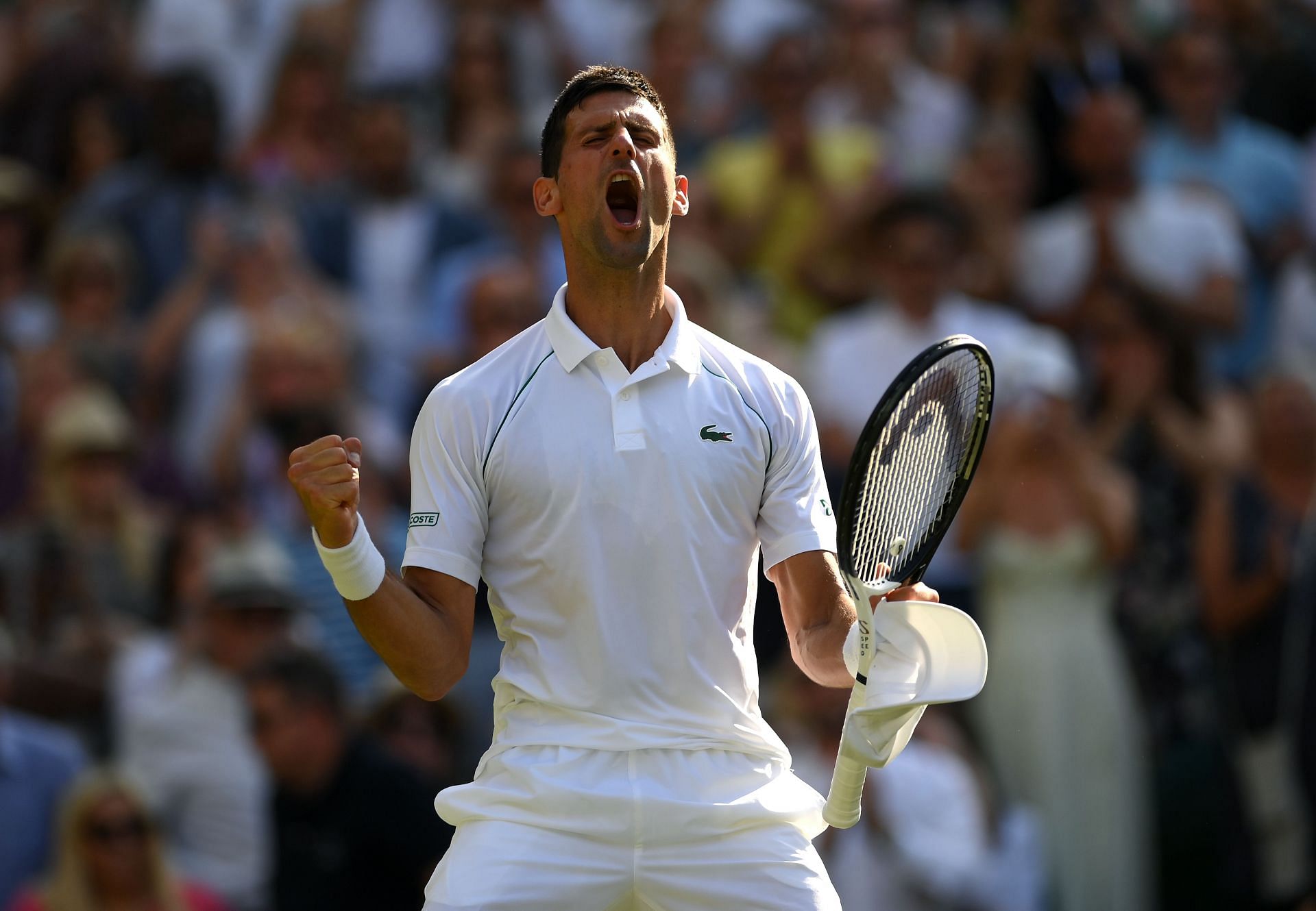 Novak Djokovic exults after reaching the Wimbledon final on Friday.