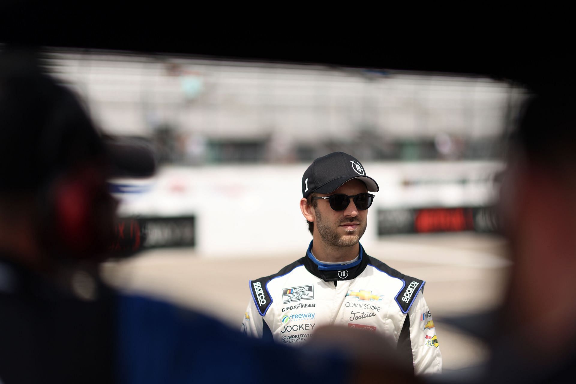 Daniel Suarez looks on during practice for the NASCAR Cup Series Ambetter 301 at New Hampshire Motor Speedway