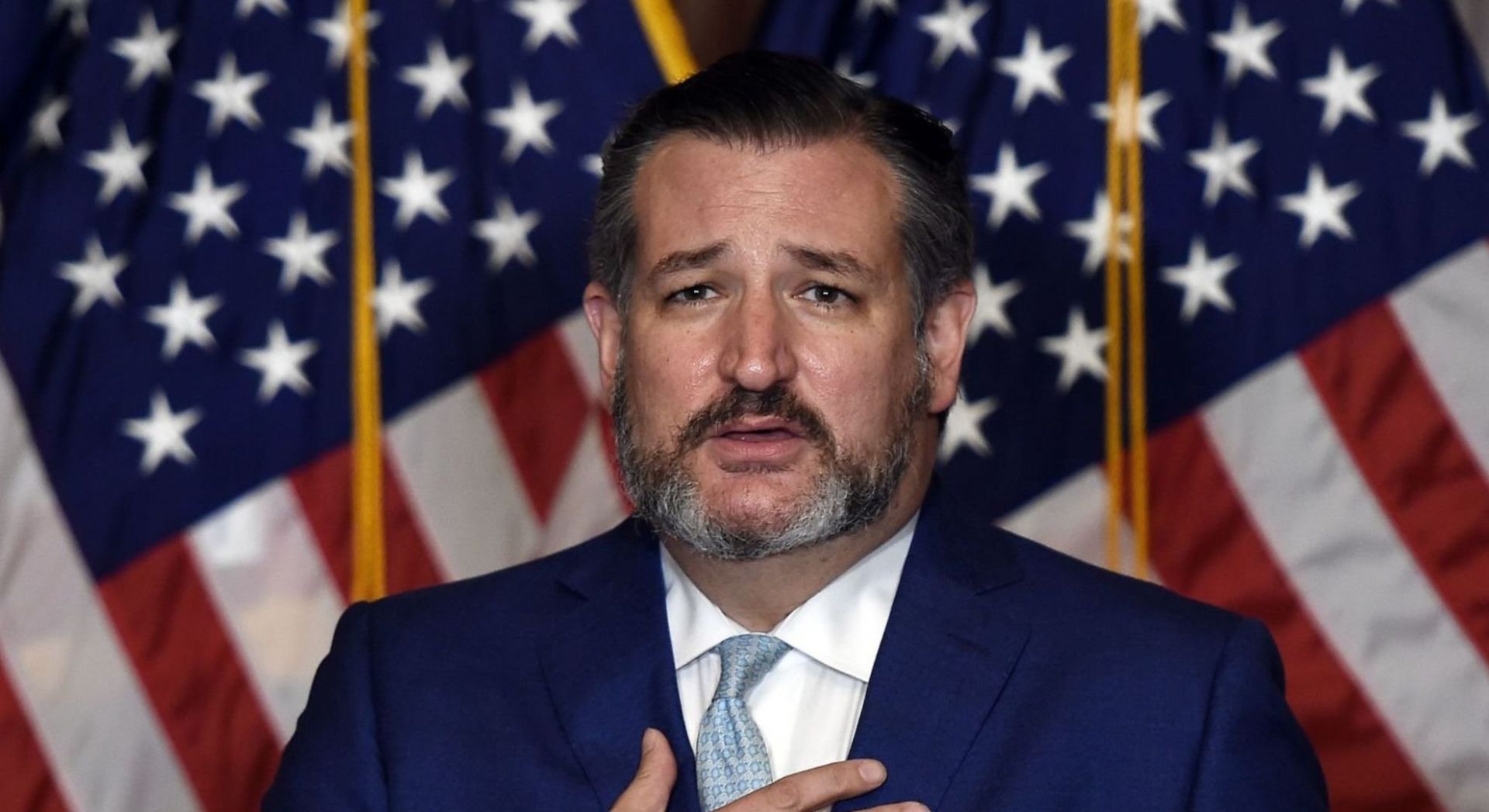 Senator Ted Cruz came under fire for fist bumping Republican colleagues after blocking the PACT Act (Image via Olivier Douliery/Getty Images)