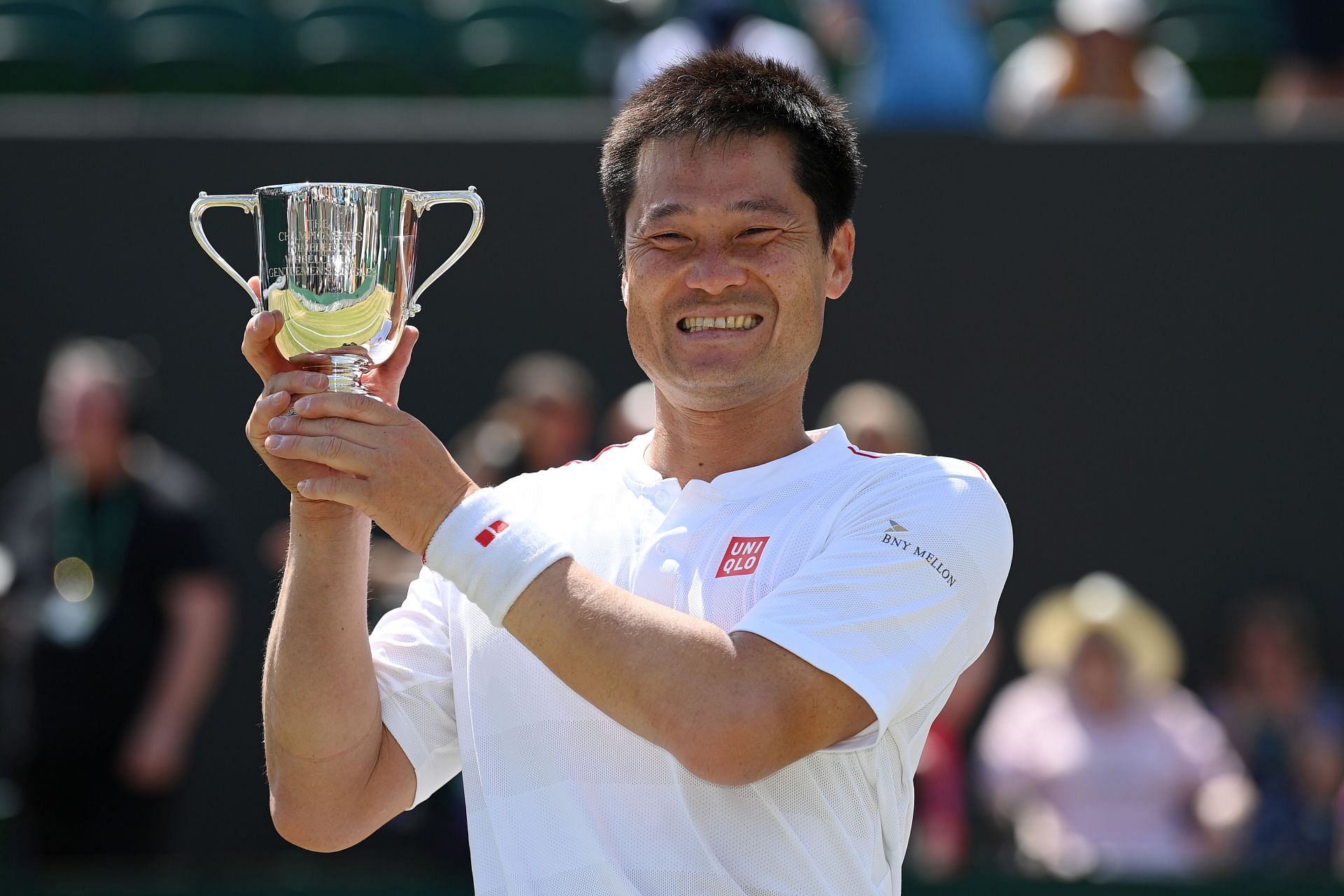 Shingo Kunieda with the 2022 Wimbledon wheelchair men&#039;s singles trophy