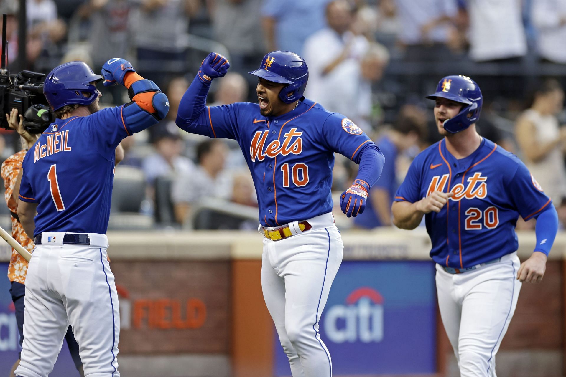Mets players celebrate during a New York Yankees v New York Mets game.