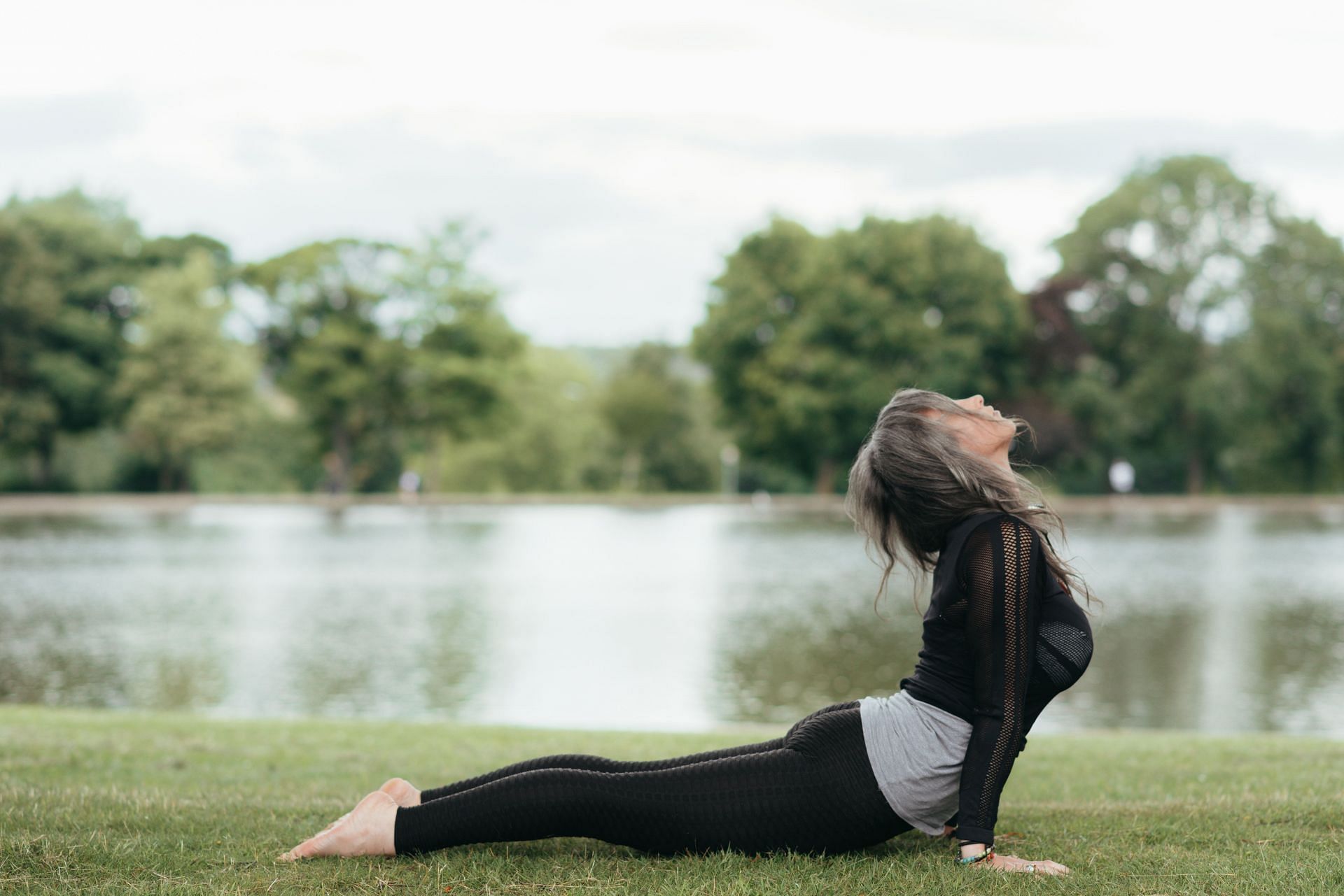 Some yoga asanas specifically target the chest and heart area (Image via Pexels @Anete Lusina)