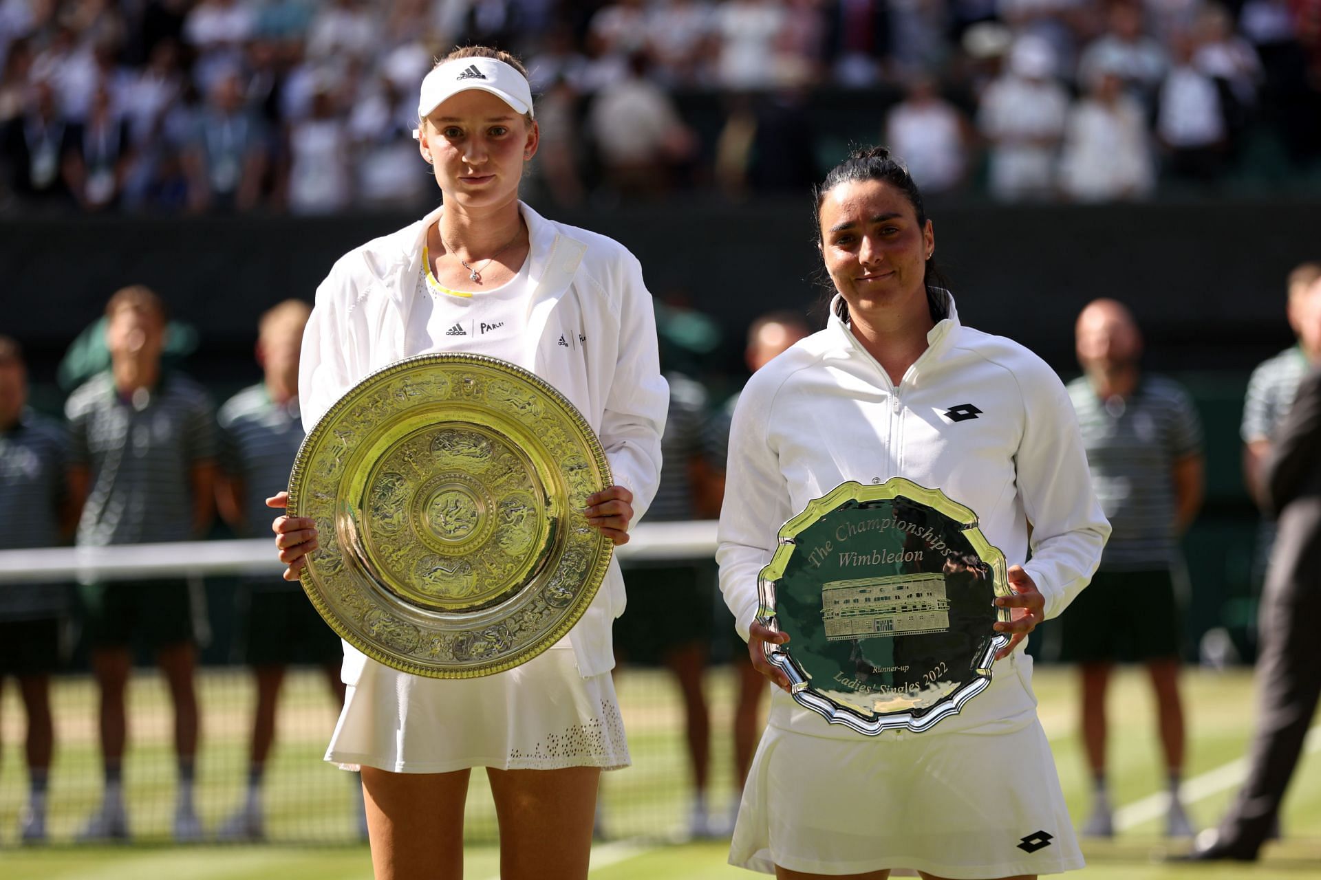 Rybakina and Jabeur with their trophies at The Championships - Wimbledon 2022