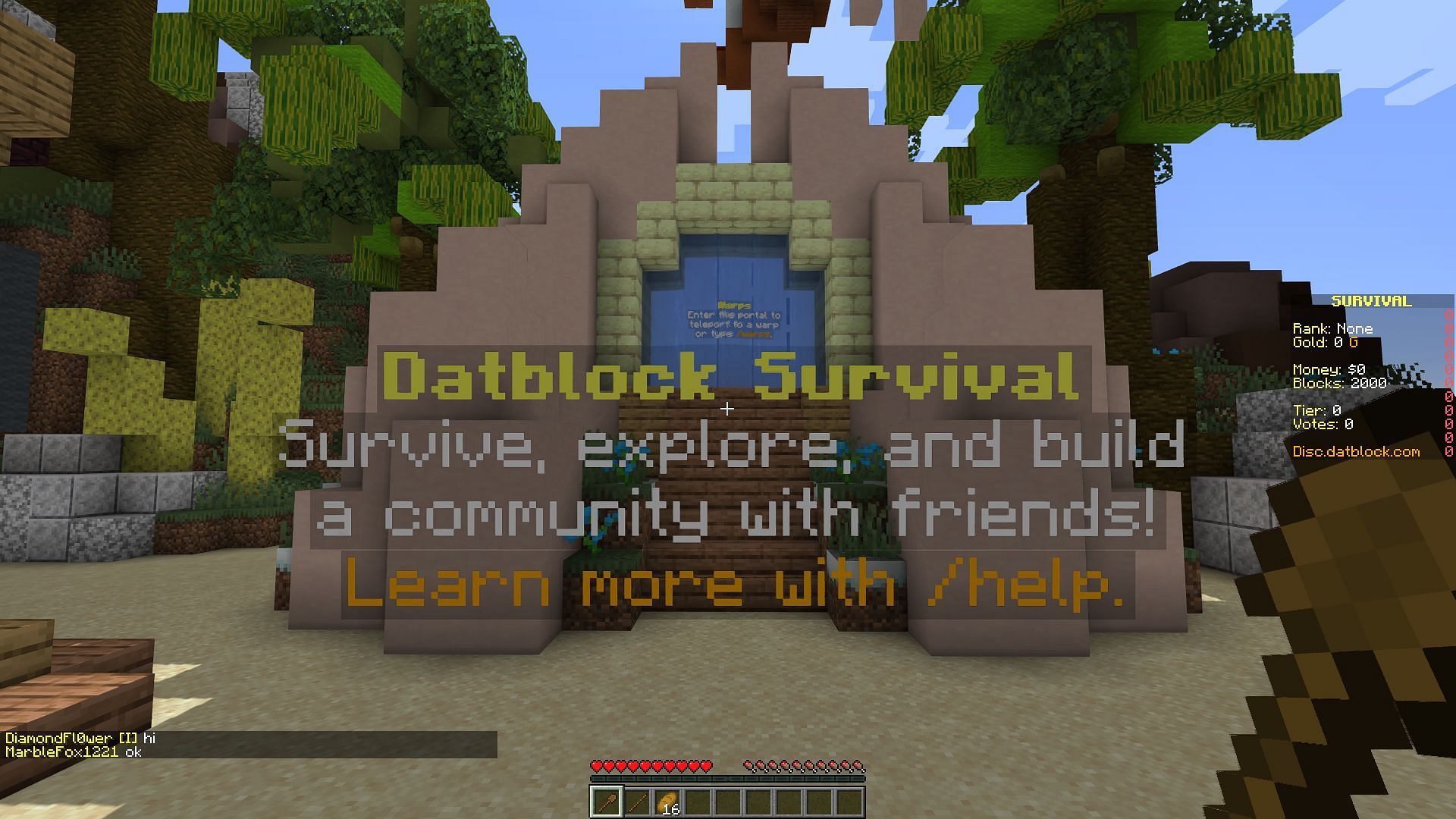 An example of a server spawn area, where players can find contact information for server administrators (Image via Minecraft)