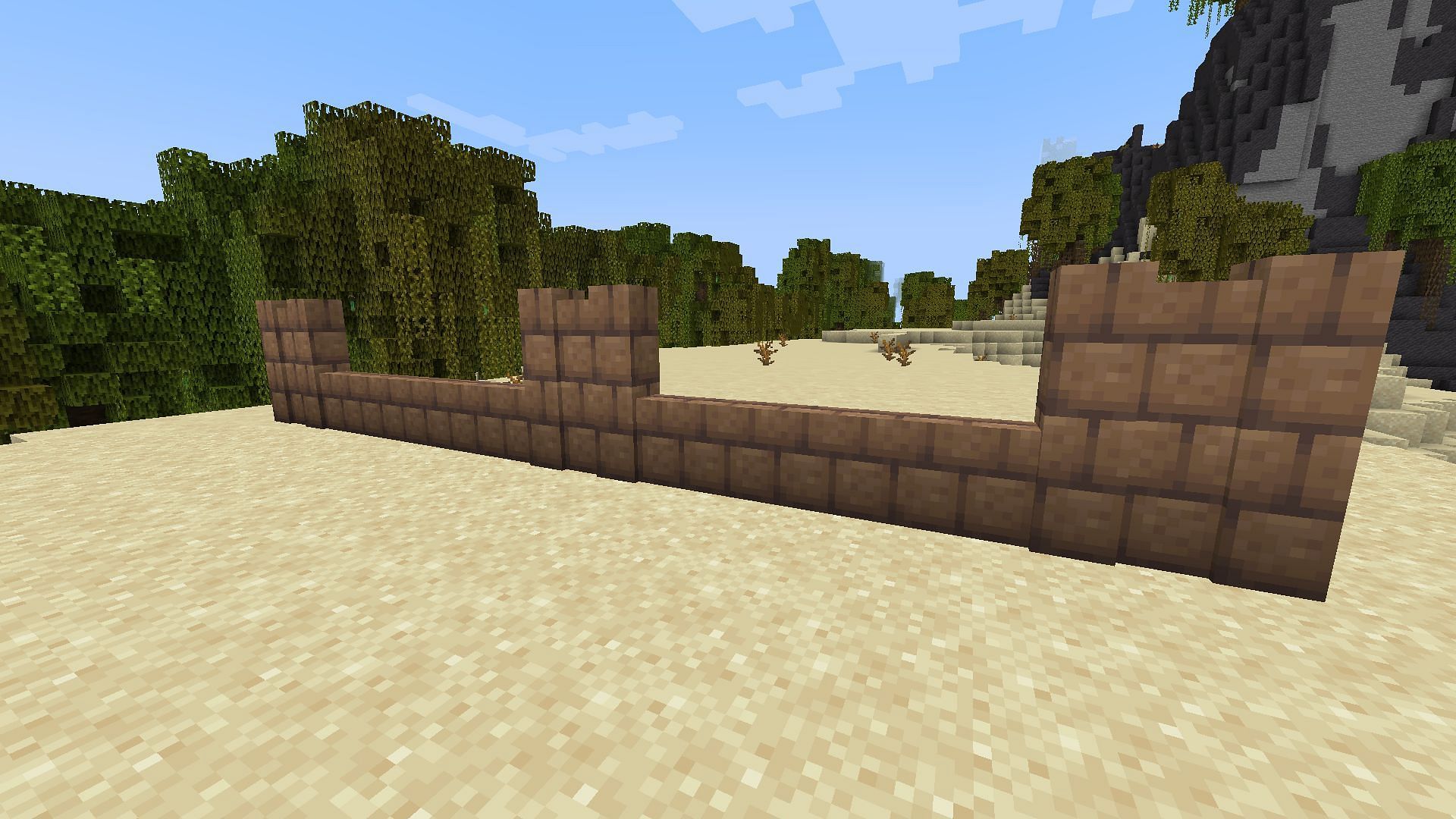 Mud brick walls can be used as fences (Image via Minecraft 1.19 update)