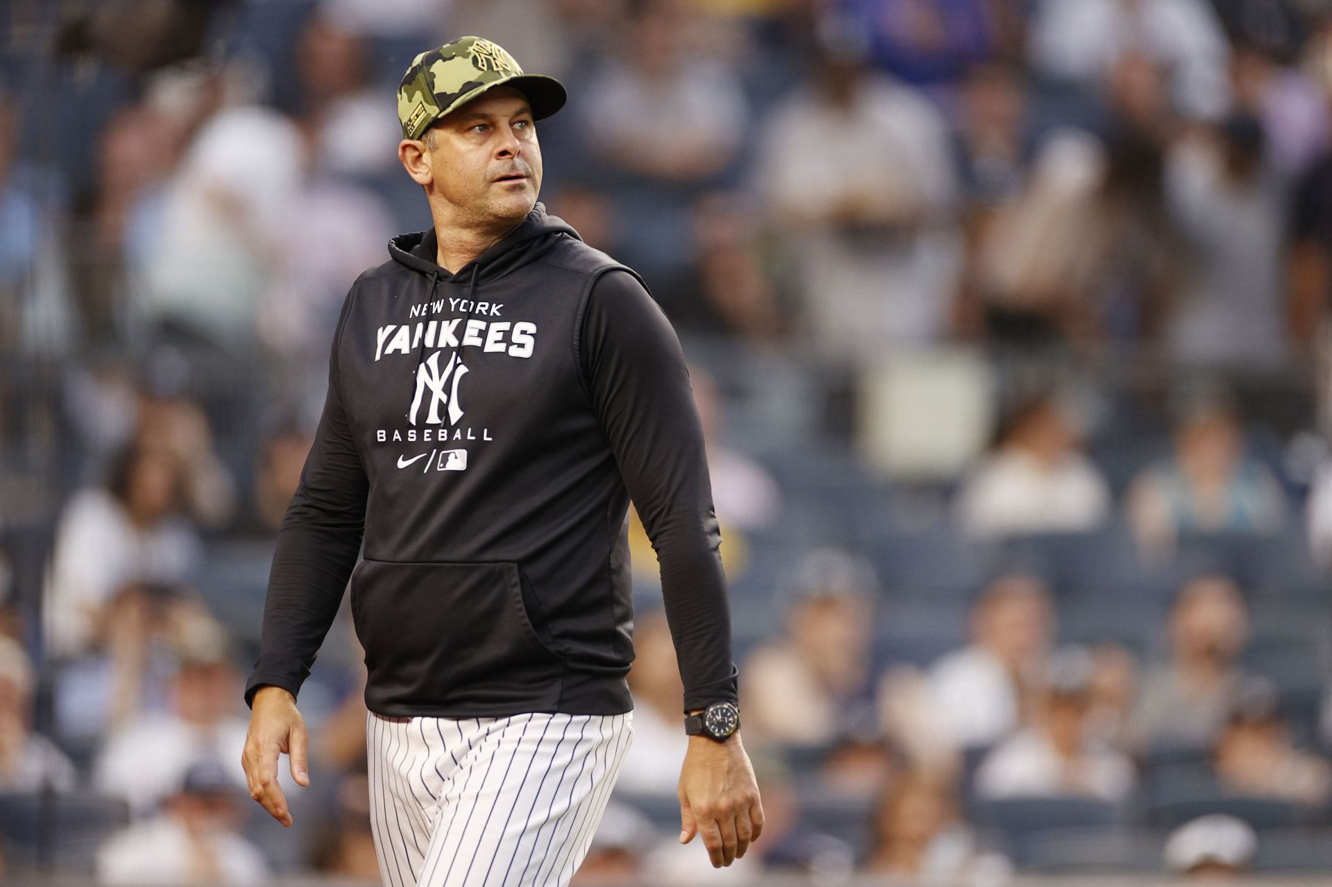 Aaron Boone looks on during a game against the Chicago White Sox at Yankee Stadium