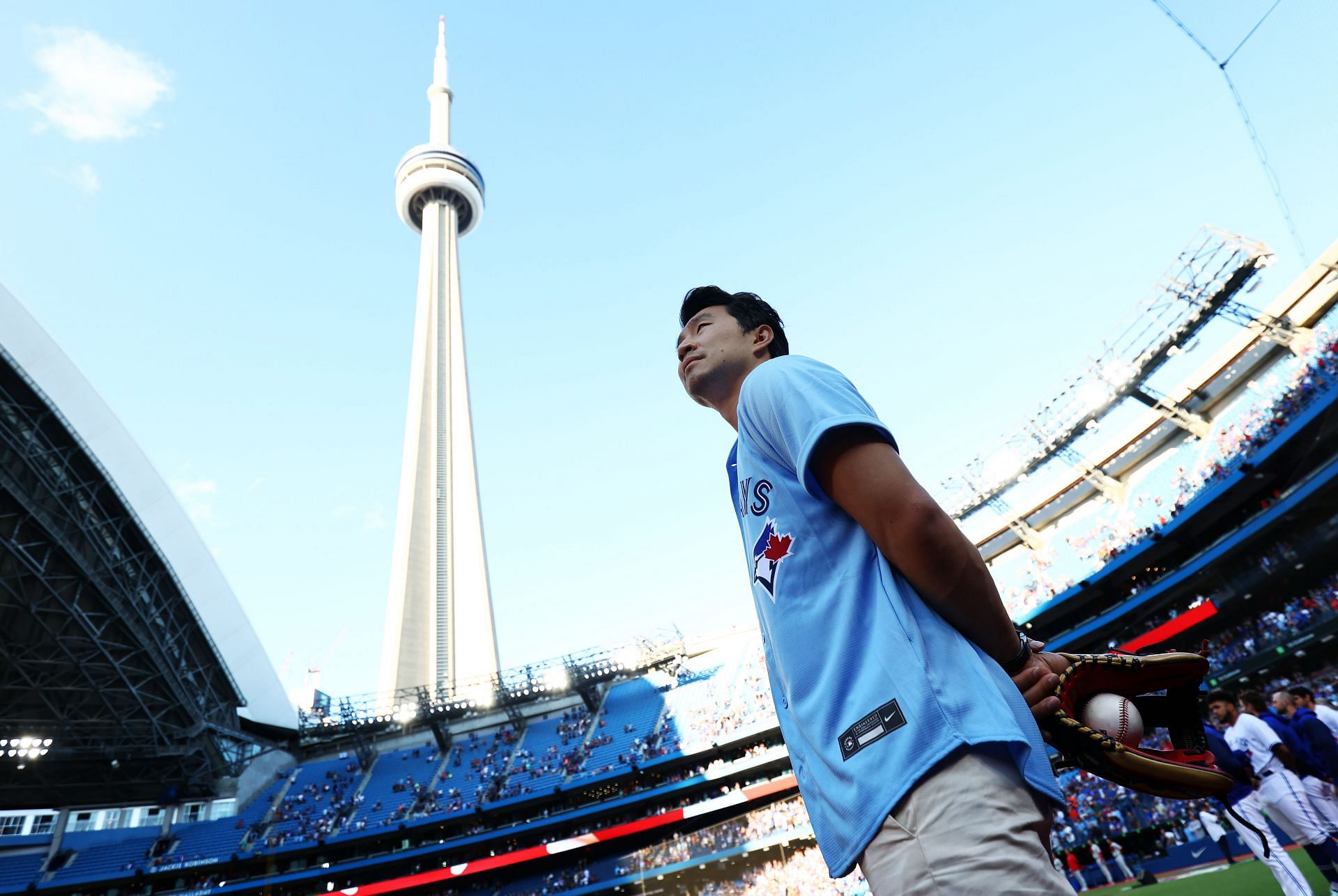 Simu Liu with the CN Tower