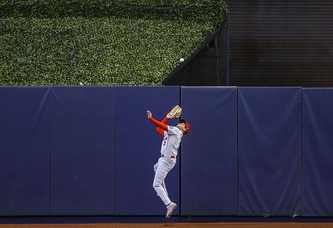 Watch: St. Louis Cardinals outfielder sends Phillies DH Darick Hall back to the dugout with a spectacular move