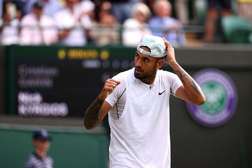 Nick Kyrgios in action at The Championships - Wimbledon 2022