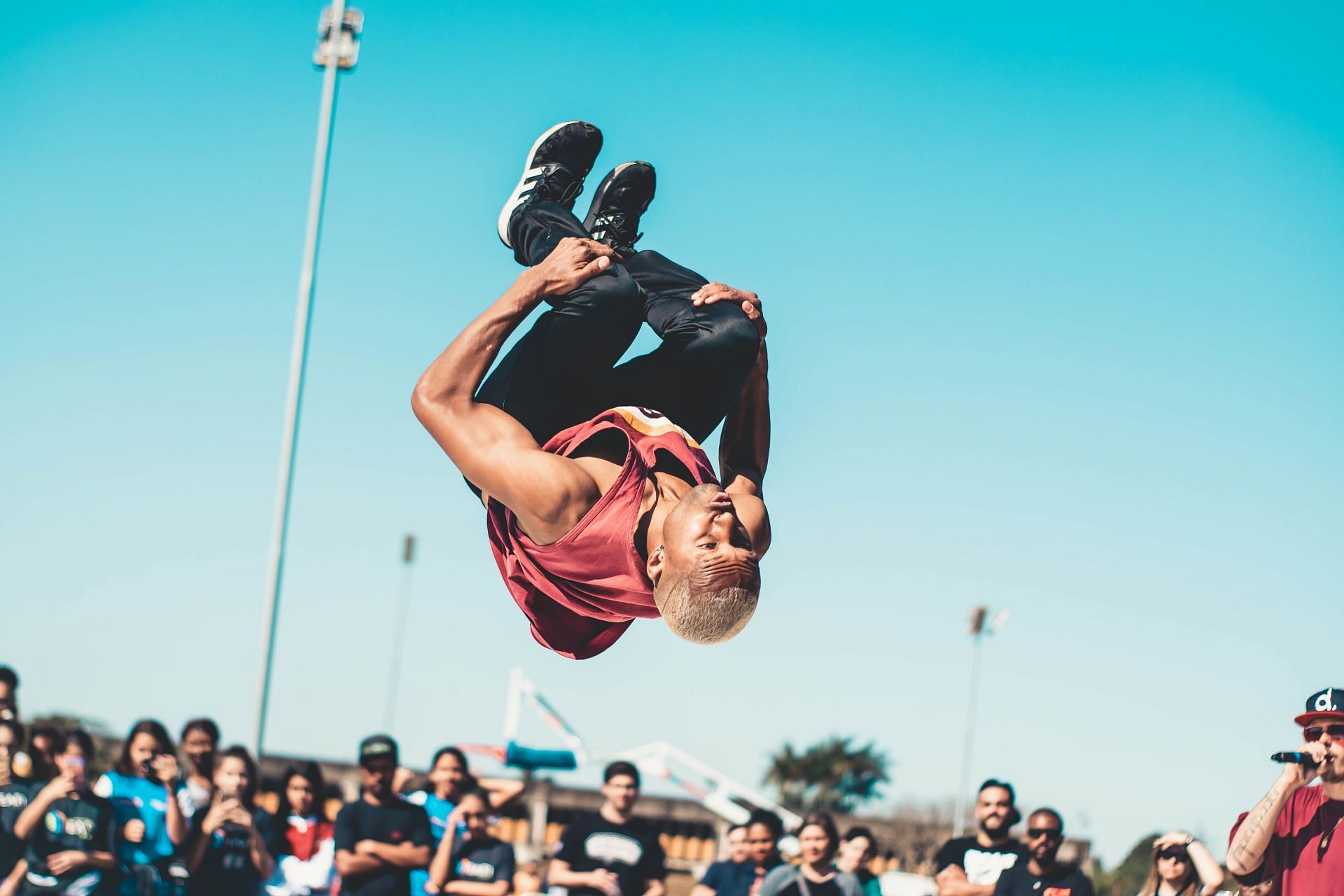 Learn how to get better at backflip with this article. (Image via Pexels/Wallace Chuck)