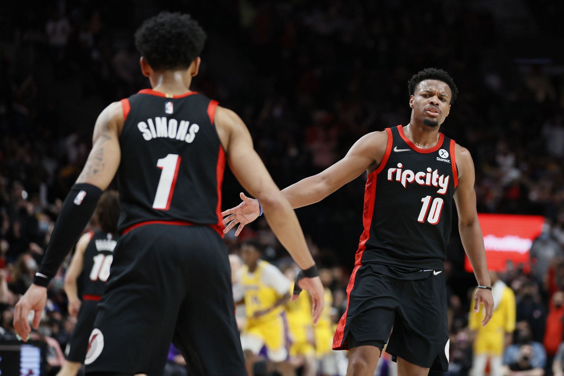 Anfernee Simons and Dennis Smith Jr. of the Portland Trail Blazers