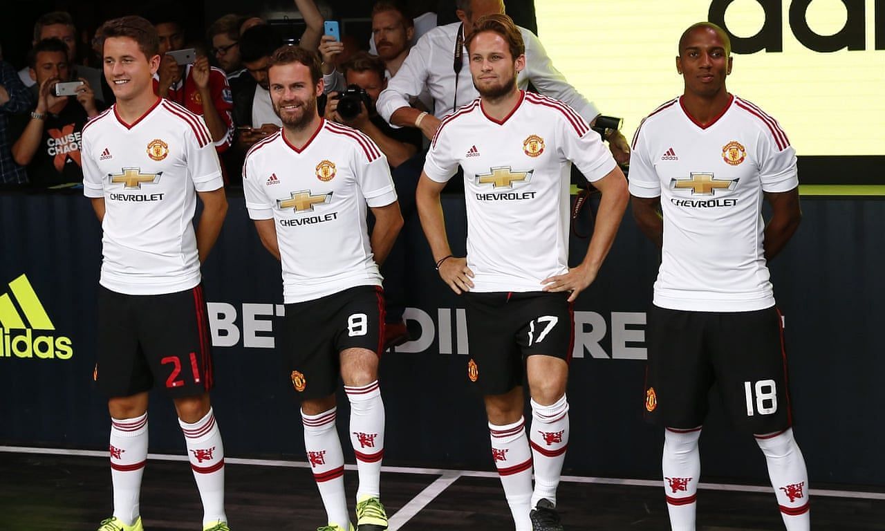 Manchester United players unveiling their away kit for the 2015-16 season