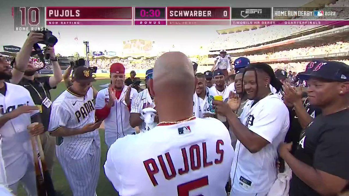 St. Louis Cardinals Albert Pujols watches a video tribute about himself on  the video screen before being named the St. Louis Cardinals recipient of  the Roberto Clemente Award on Roberto Clemente Day