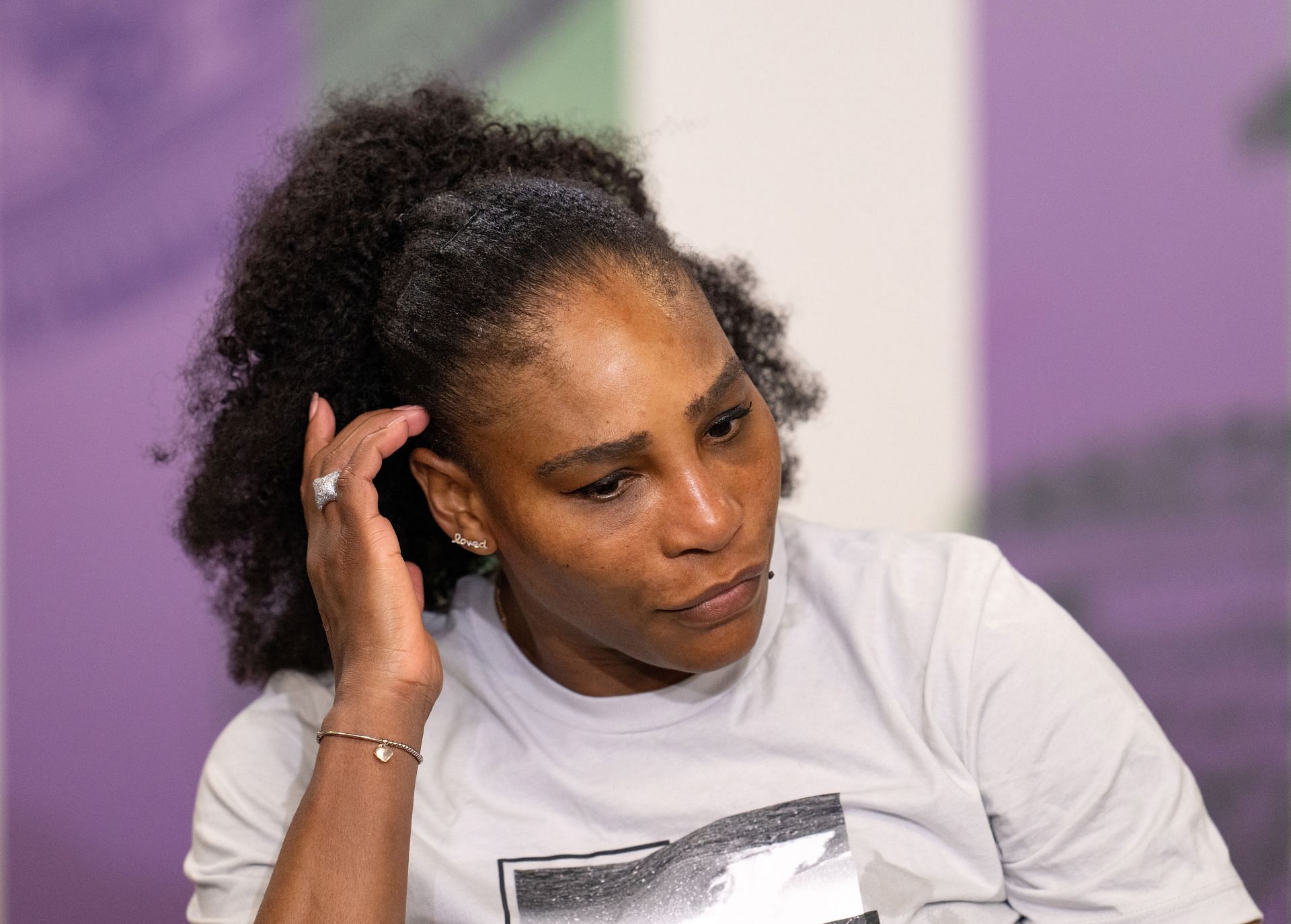Serena Williams looks distraught following her opening-round defeat at Wimbledon 2022