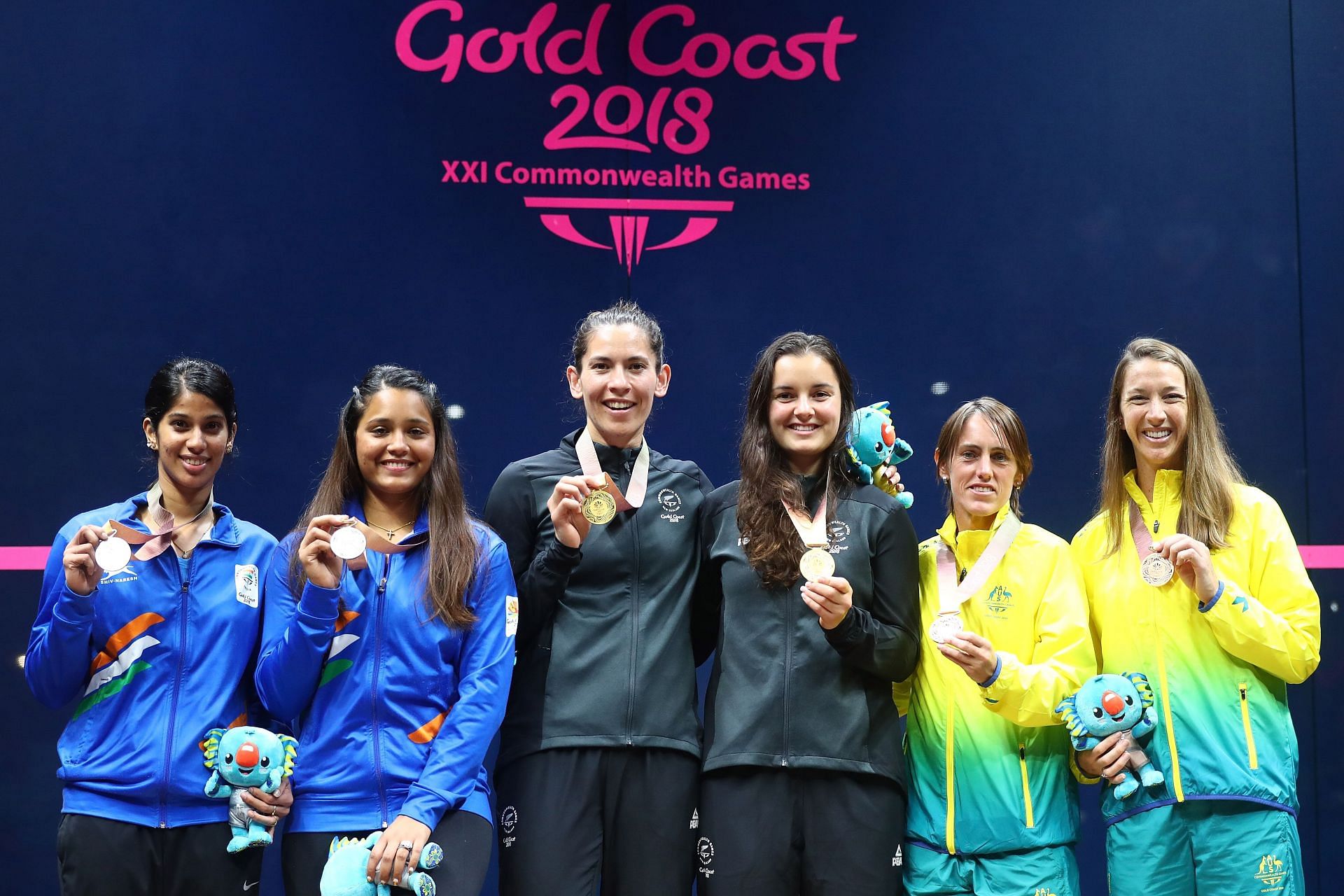 (L-R) Joshna Chinappa & Dipika Pallikal (in blue) on the podium at the 2018 Commonwealth Games. (Image courtesy: Getty Images)