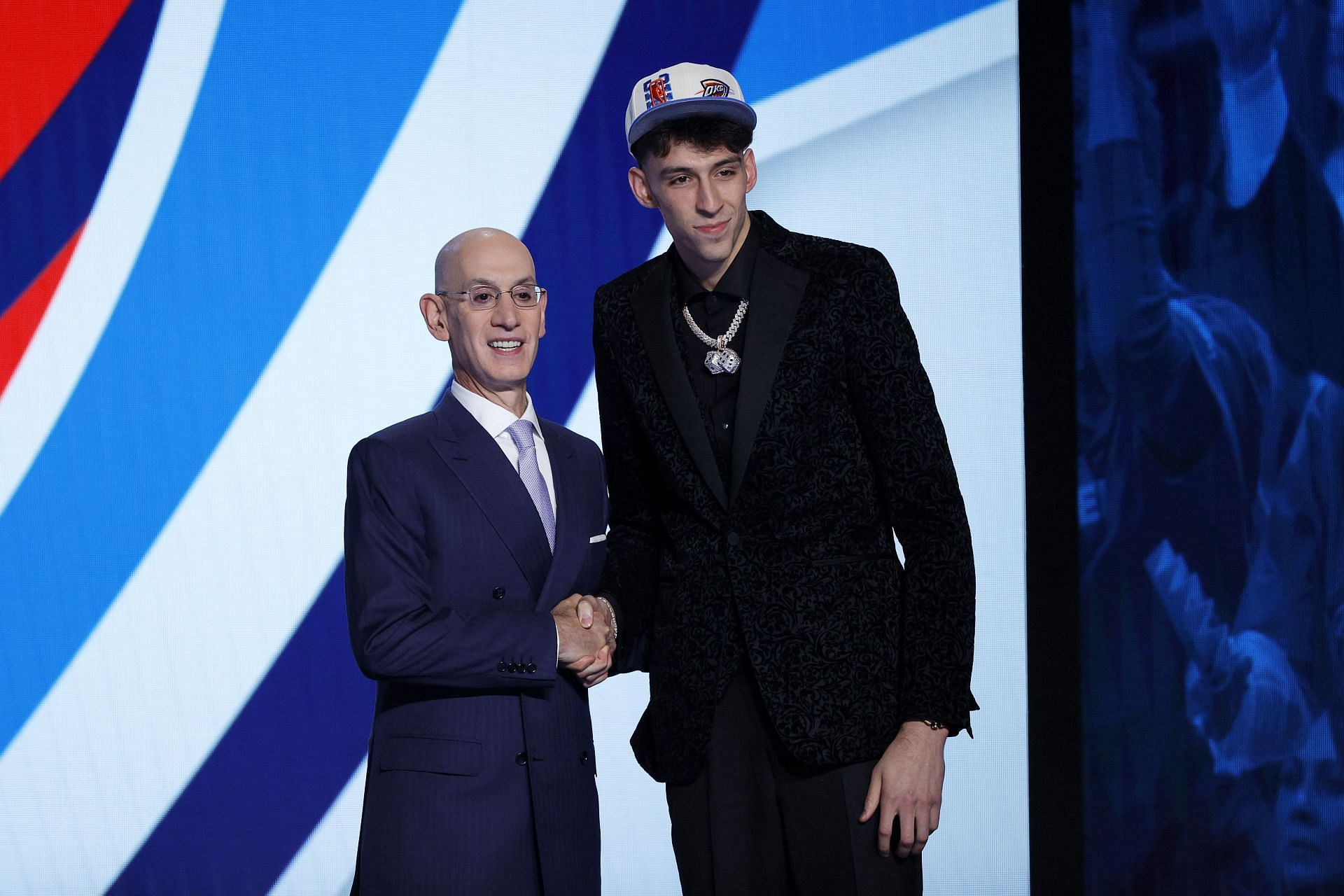 Chet Holmgren with NBA commissioner Adam Silver after getting selected as the second overall pick by the OKC Thunder during the 2022 NBA Draft