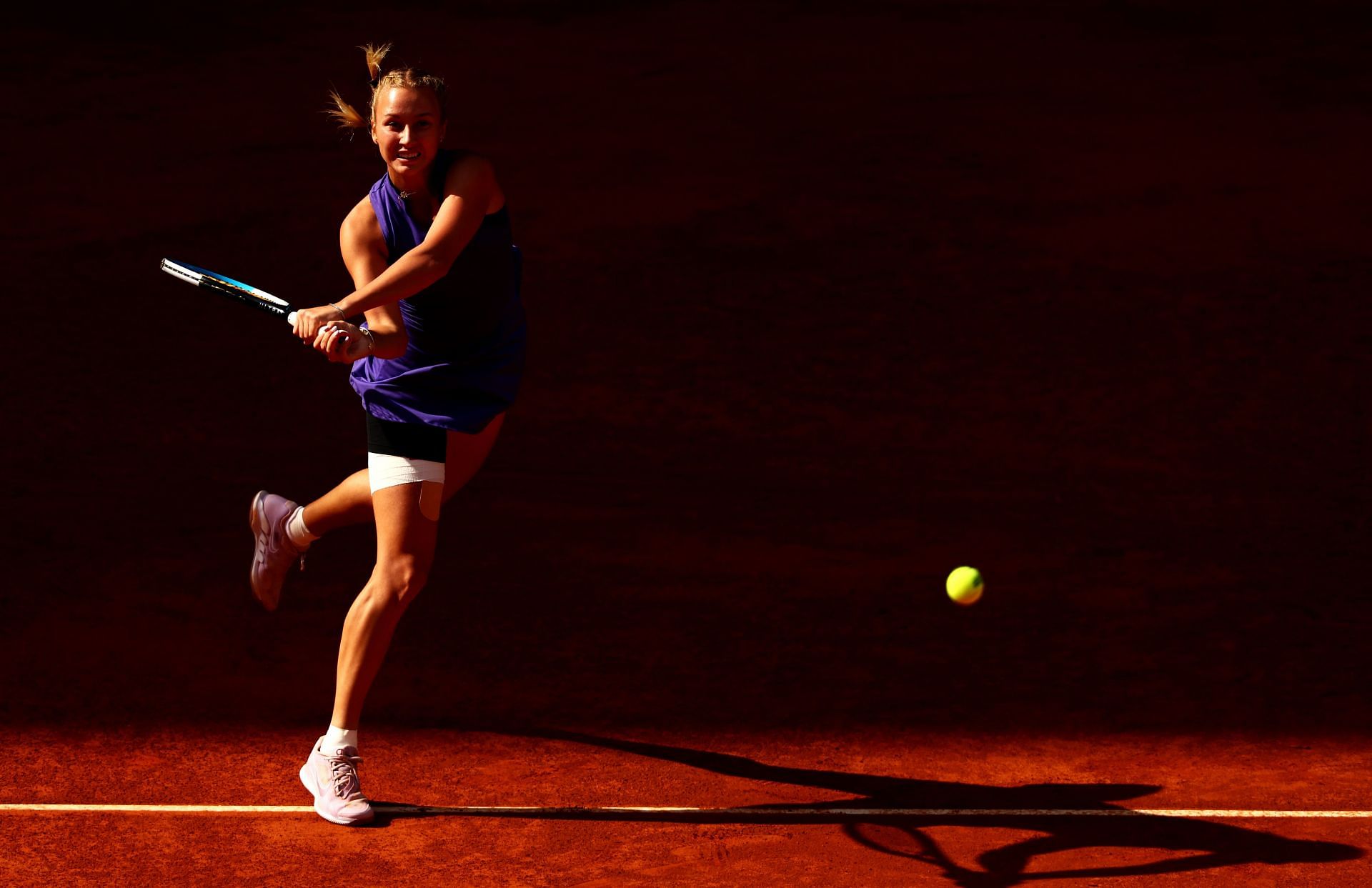 Anastasia Potapova in action at the 2022 Madrid Open