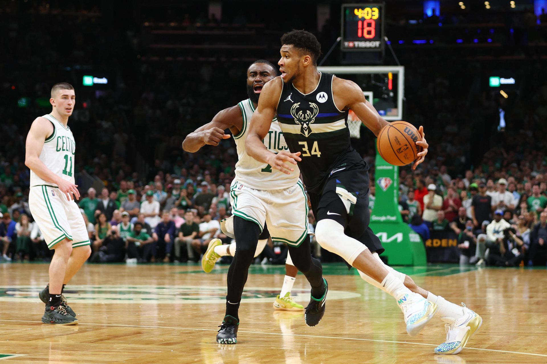 Giannis Antetokounmpo of the Milwaukee Bucks going up against the Boston Celtics