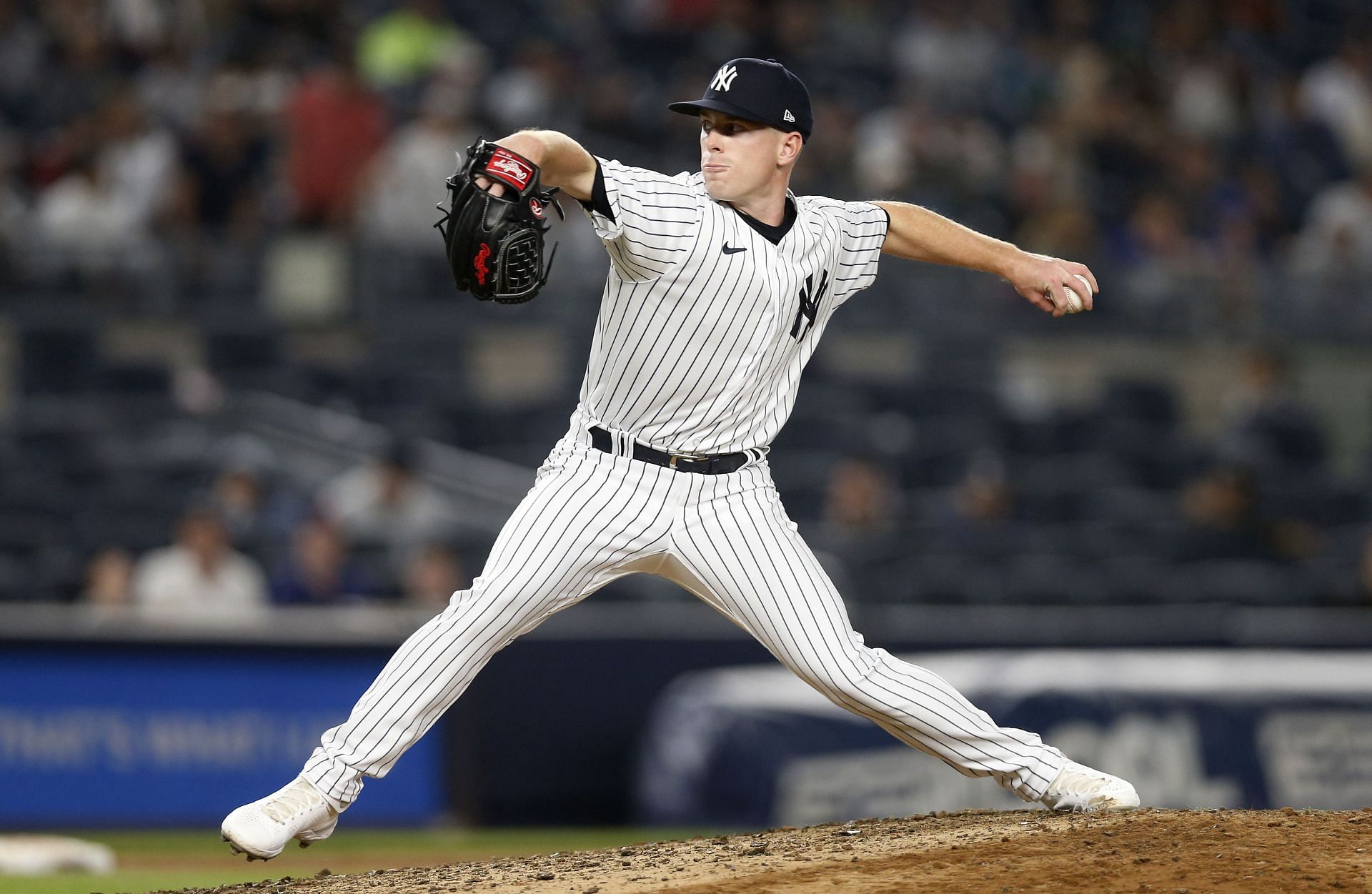 JP Sears of the New York Yankees pitches during the ninth inning against the Toronto Blue Jays