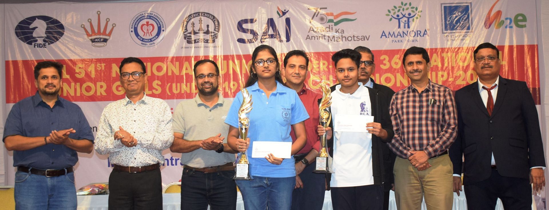 Champions Rakshitta Ravi (L) and Vrashank Chouhan display their trophies at the PYC Hindu Gymkhana in Pune on Wednesday. (Pic credit: MCA)