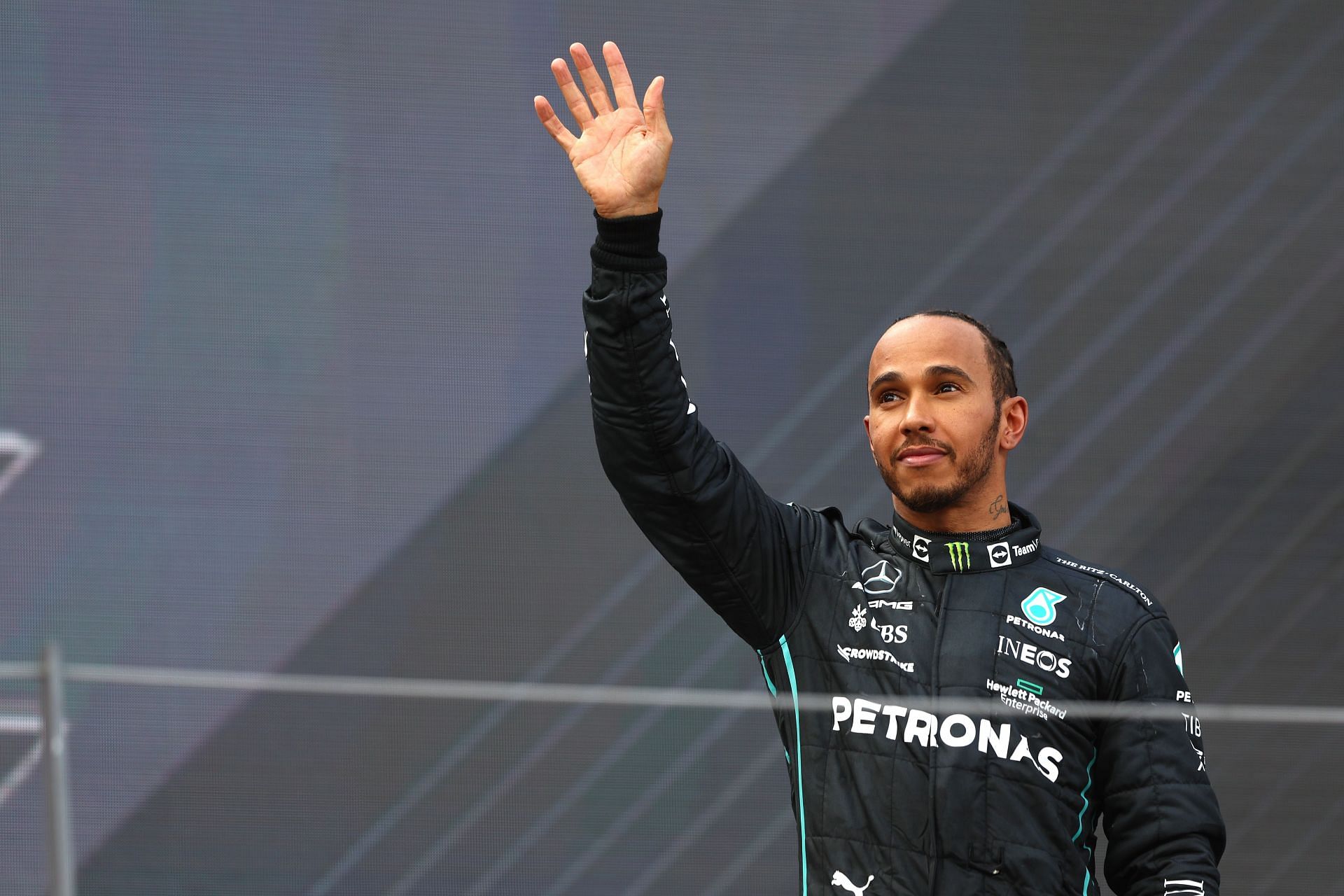 Mercedes driver Lewis Hamilton on the podium at the 2022 F1 Austrian GP (Photo by Clive Rose/Getty Images)