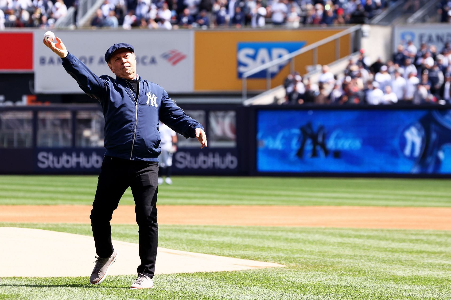 Actor Billy Crystal threw out the first pitch prior to the start of the game between the New York Yankees and the Boston Red Sox at Yankee Stadium on April 8.